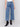 Medium blue jeans with front patch pockets and a flared leg, featuring a mid-rise by Charlie B.