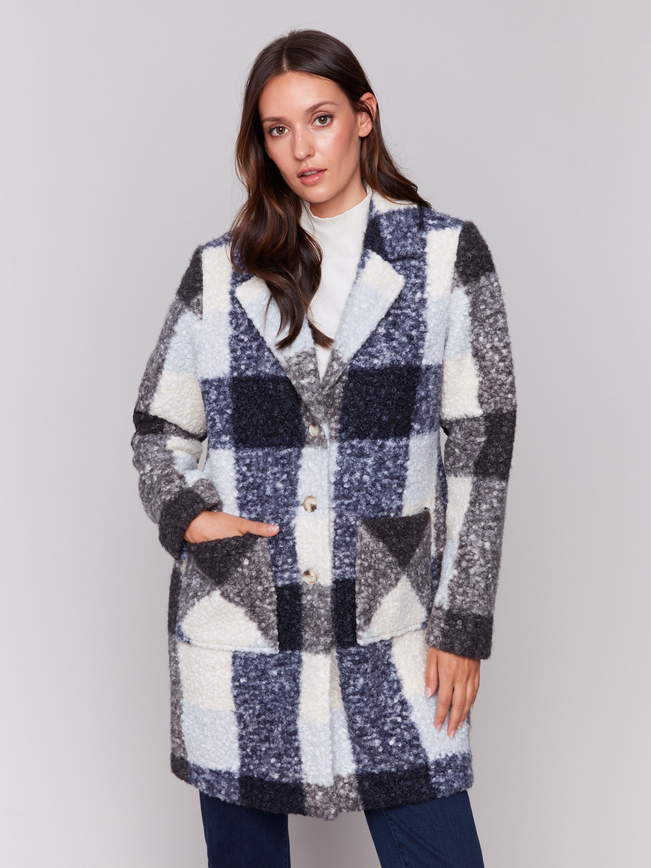 Navy blue plaid bouclé knit coat featuring a tailored collar and patch pockets by Charlie B.