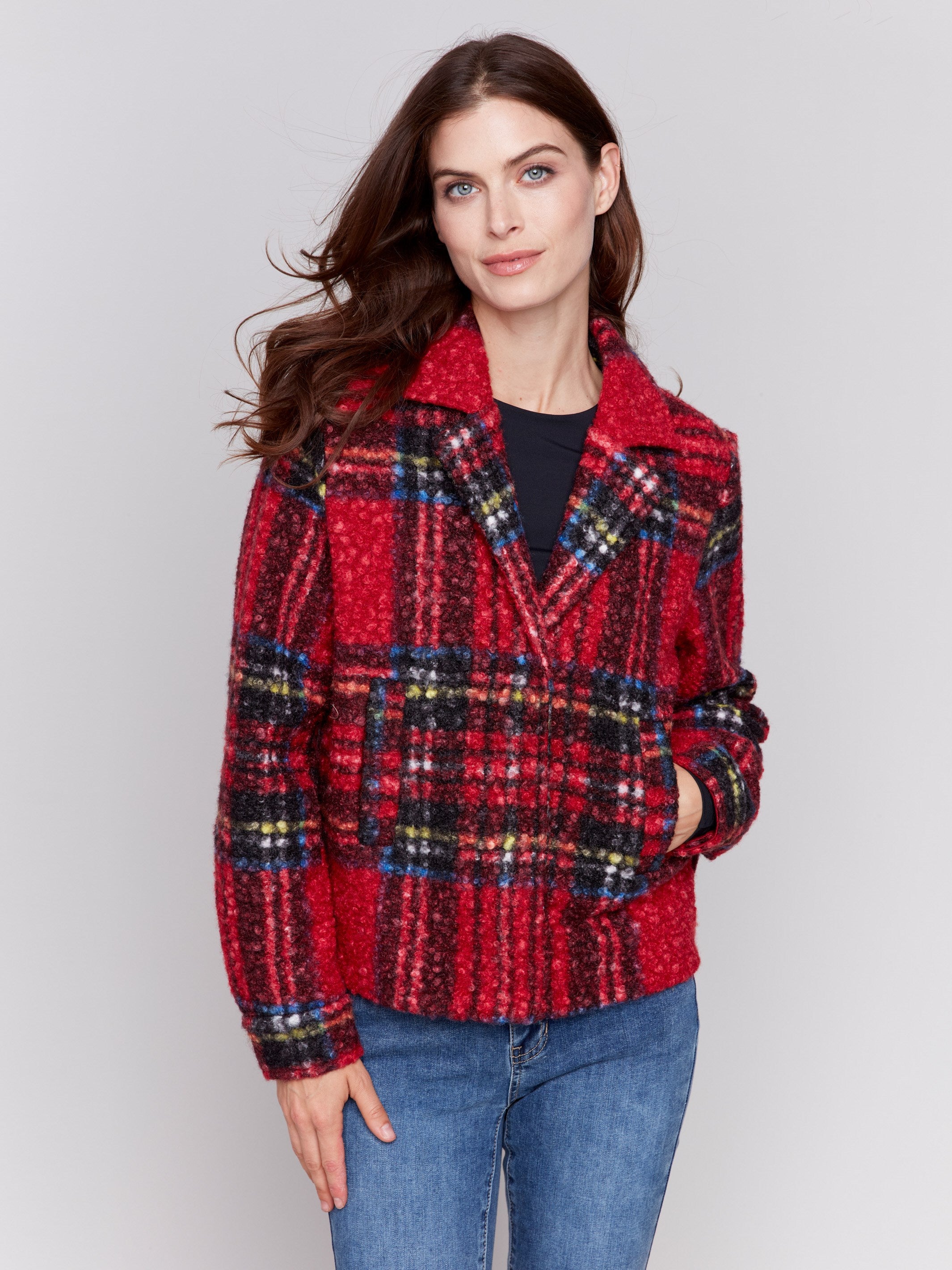 Short cranberry red plaid bouclé knit jacket with notch collar and welt pockets, featuring a full-button closure by Charlie B.