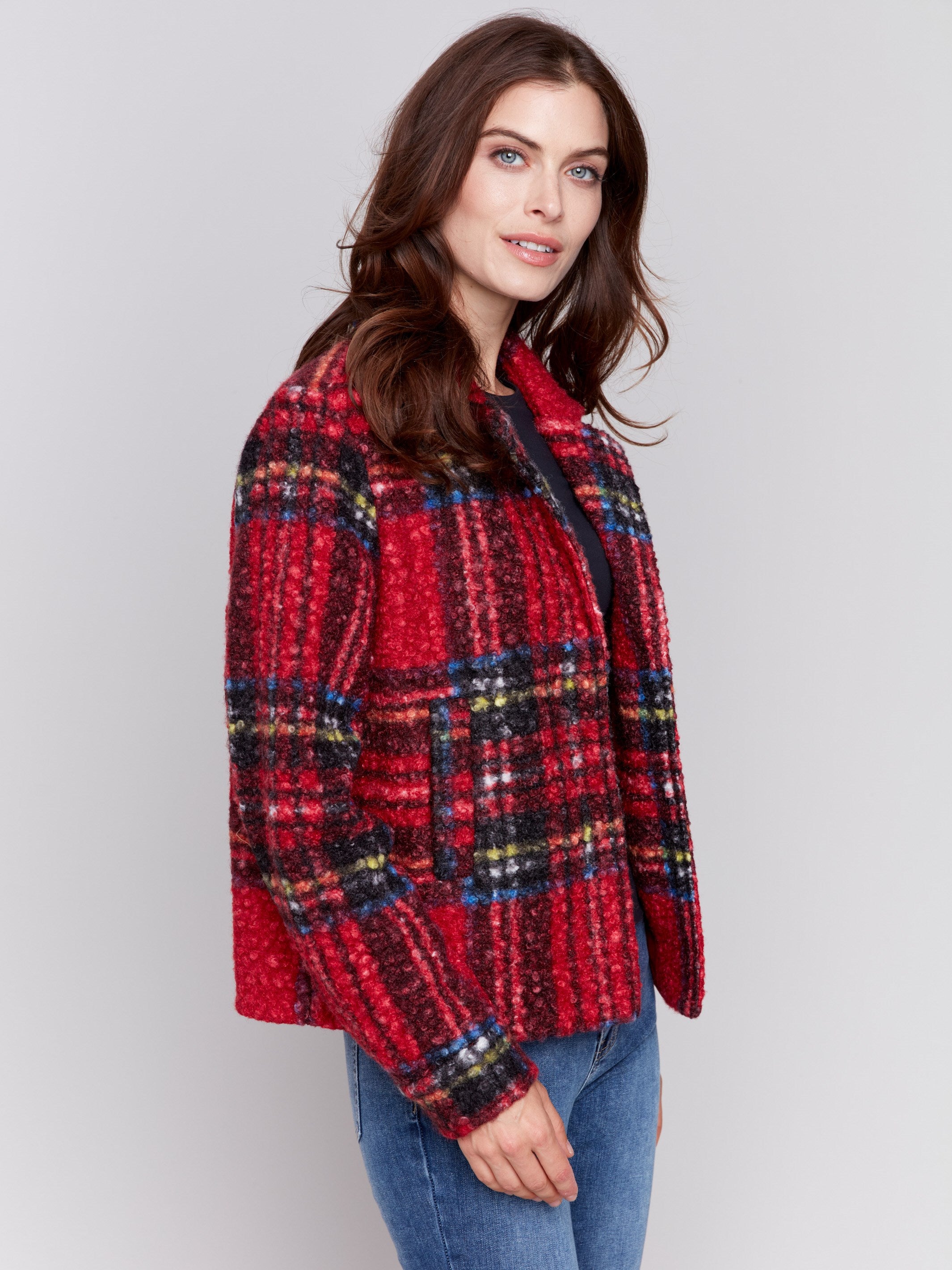 Short cranberry red plaid bouclé knit jacket with notch collar and welt pockets, featuring a full-button closure by Charlie B.