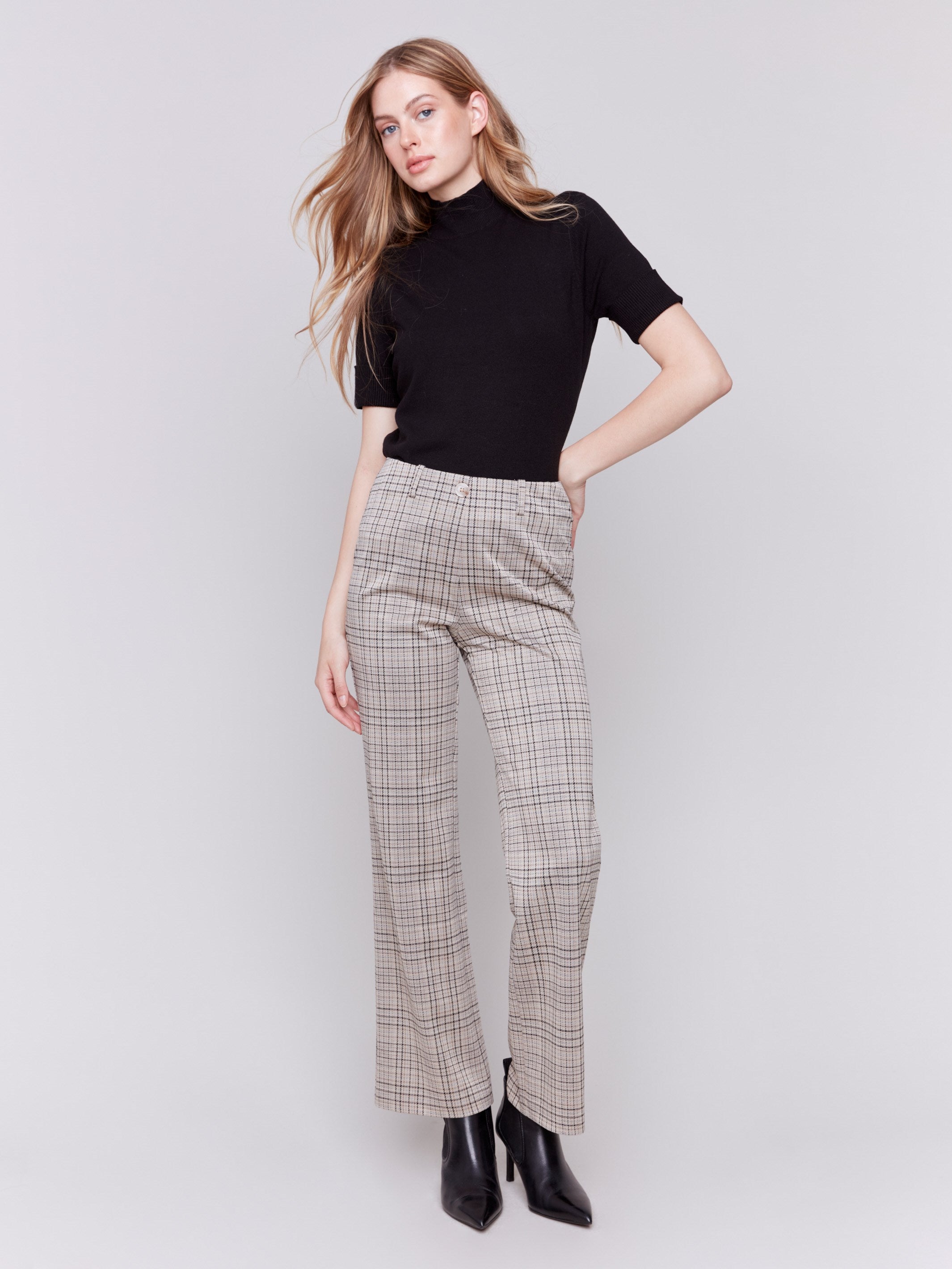 Almond-colored houndstooth plaid pull-on flared pants with high rise and back pockets by Charlie B.