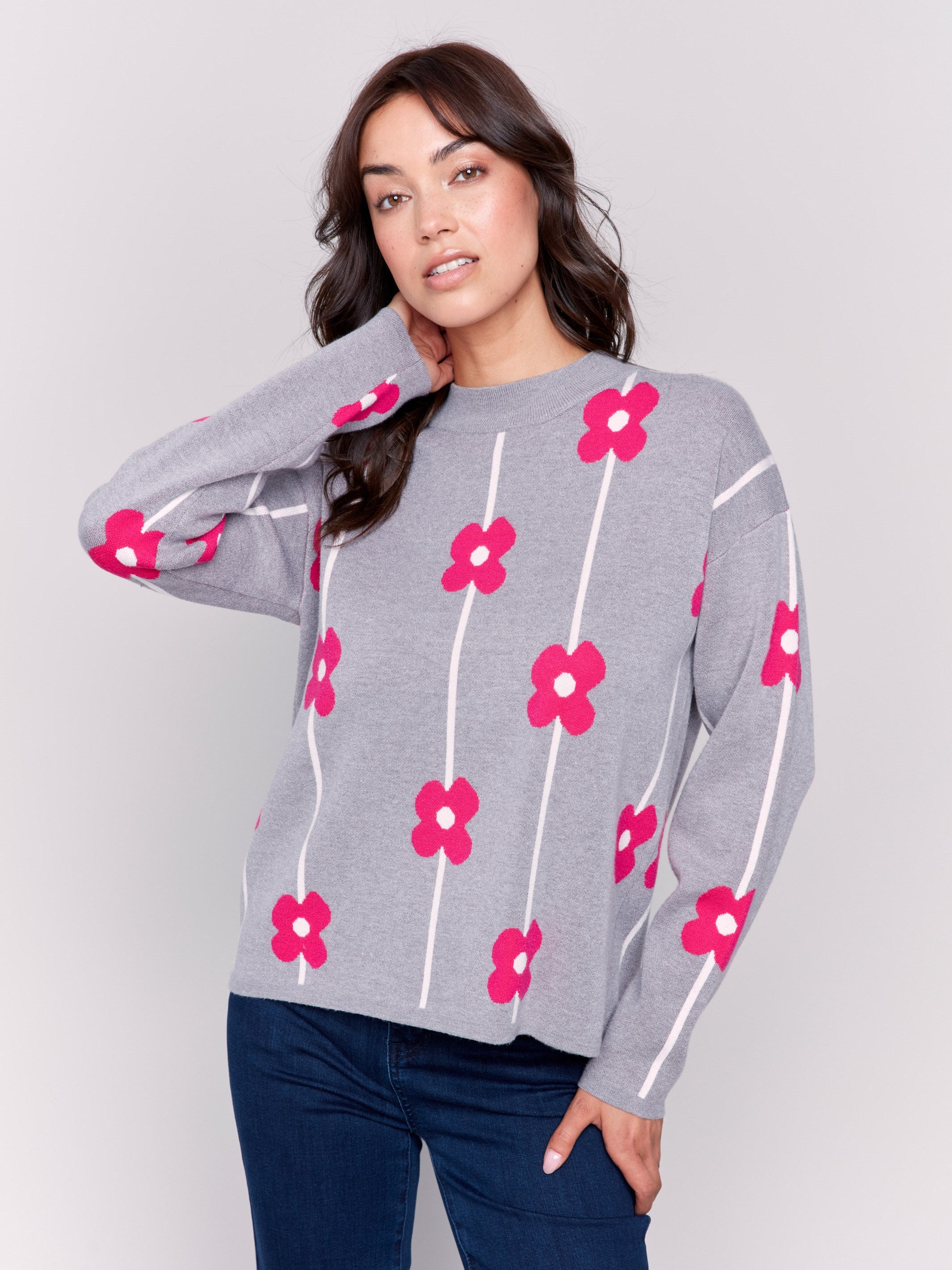 Heather grey sweater with pink floral print and a round neckline by Charlie B.