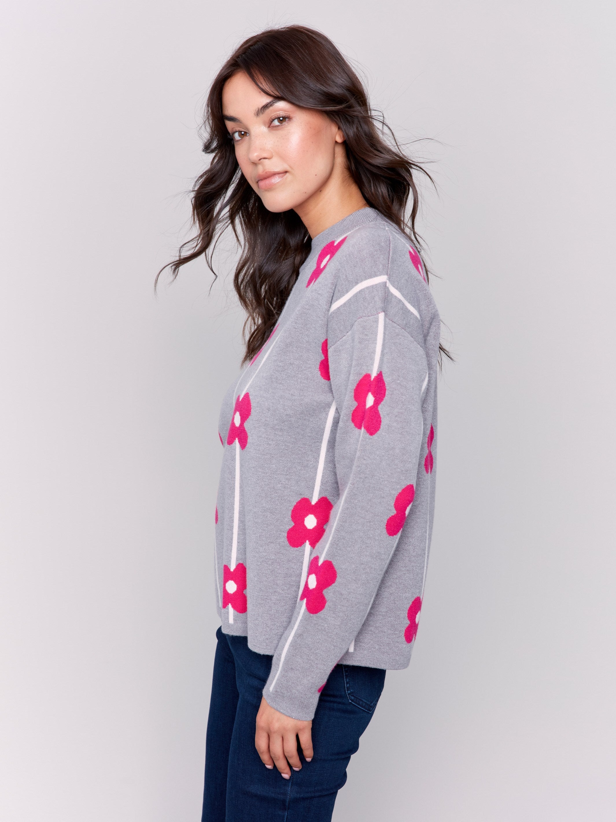 Heather grey sweater with pink floral print and a round neckline by Charlie B.