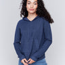 Denim blue knit hoodie sweater with long sleeves and front pocket by Charlie B.