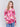 Fuchsia pink abstract print plush knit sweater with rounded hem and hidden pockets by Charlie B.