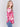 Fuchsia pink abstract print plush knit sweater with rounded hem and hidden pockets by Charlie B.