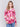 Fuchsia pink abstract print plush knit sweater with rounded hem and hidden pockets by Charlie B.