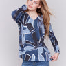 Denim blue V-neck sweater with an abstract print and drop shoulders by Charlie B.