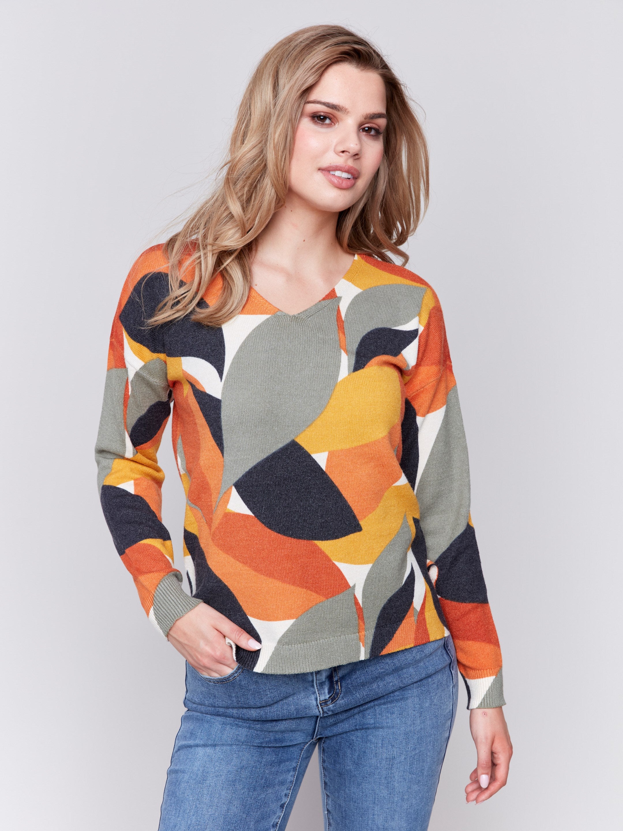 Spruce and multi-color abstract V-neck sweater with drop shoulders by Charlie B.