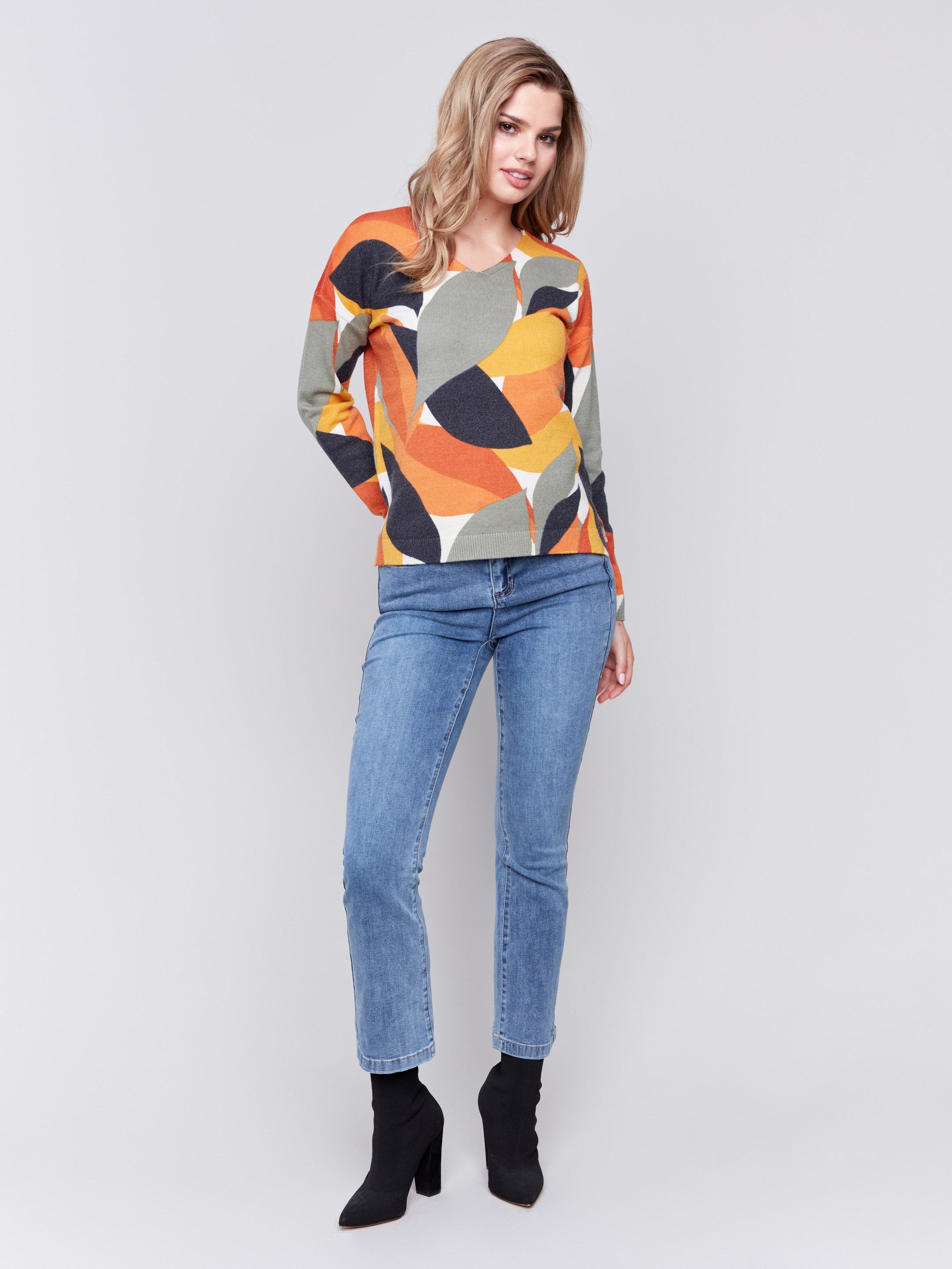 Spruce and multi-color abstract V-neck sweater with drop shoulders by Charlie B.