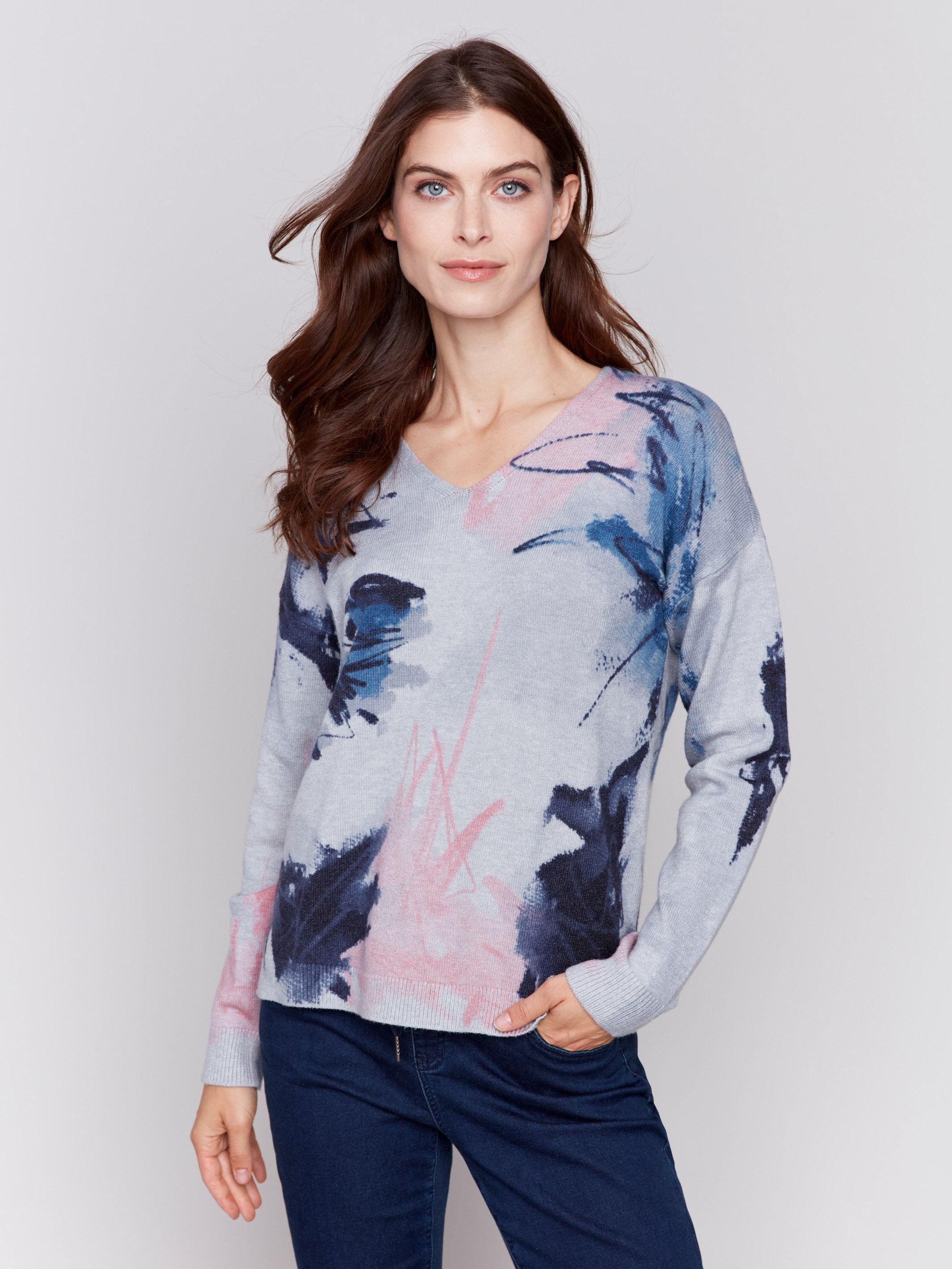 Light grey V-neck sweater with an abstract print and drop shoulders by Charlie B.