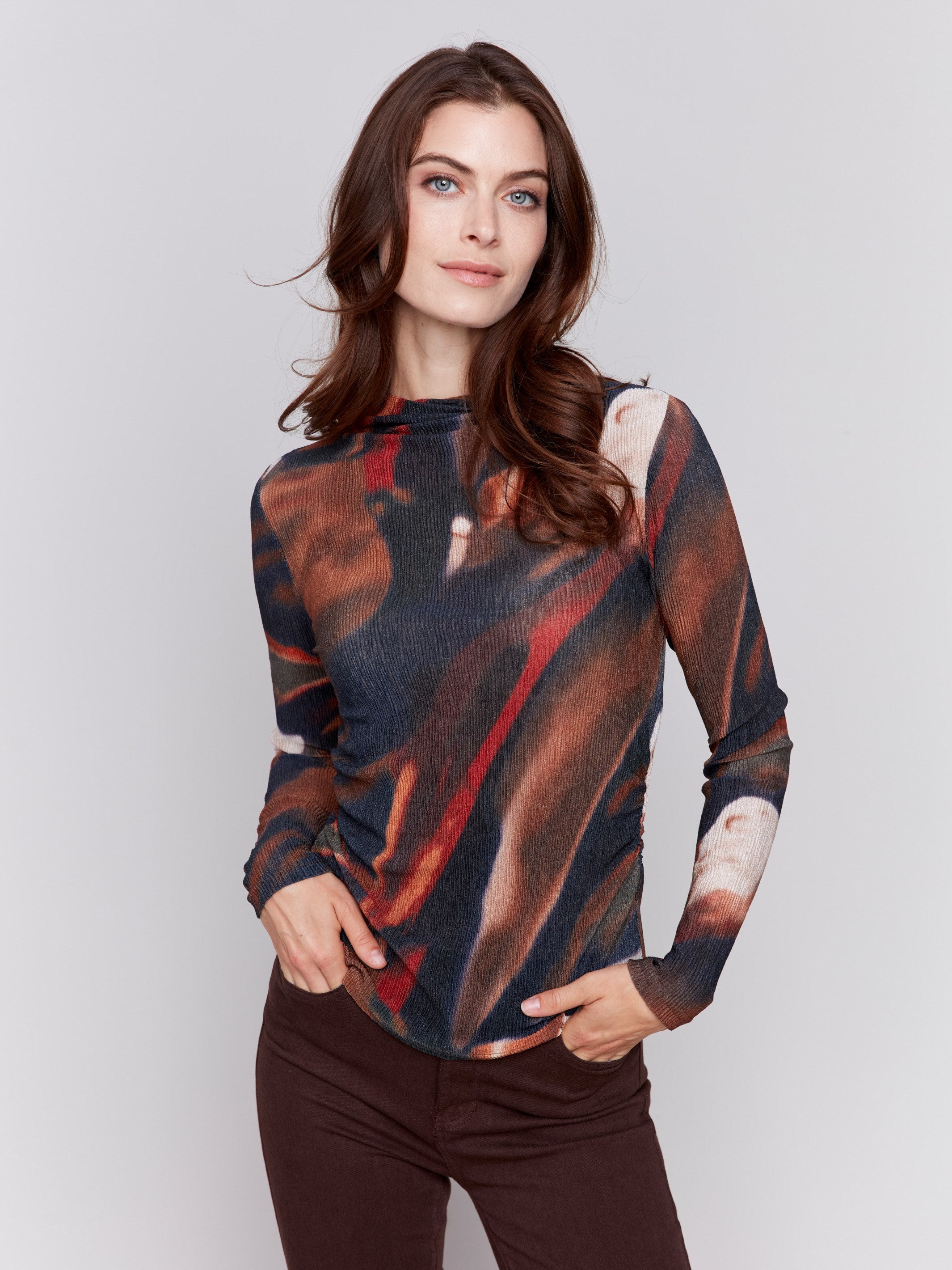 Long sleeve mock neck top with an abstract pattern in spruce tones by Charlie B.