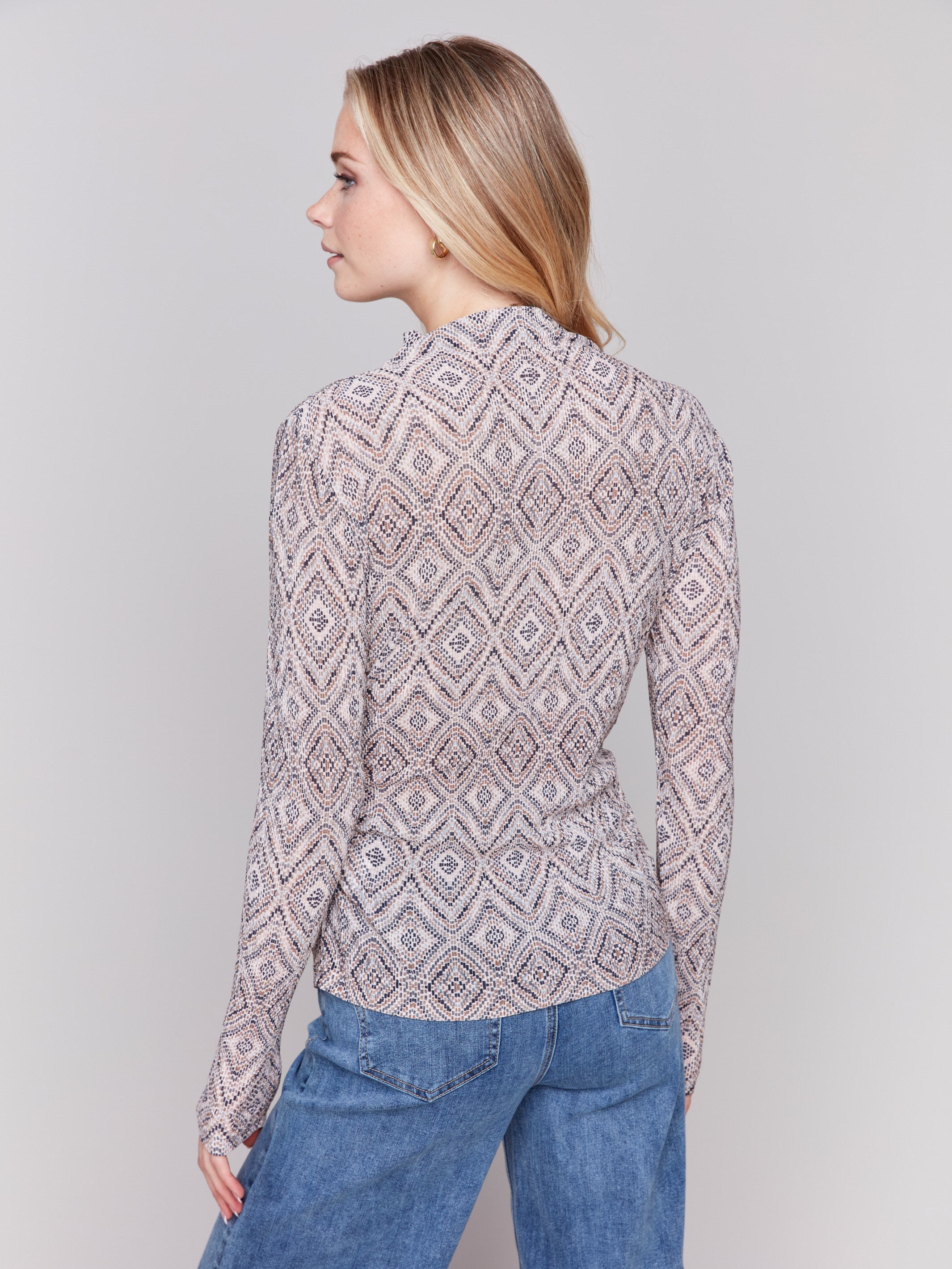 Long sleeve mock neck top with a geometric pattern in Mosaic by Charlie B.