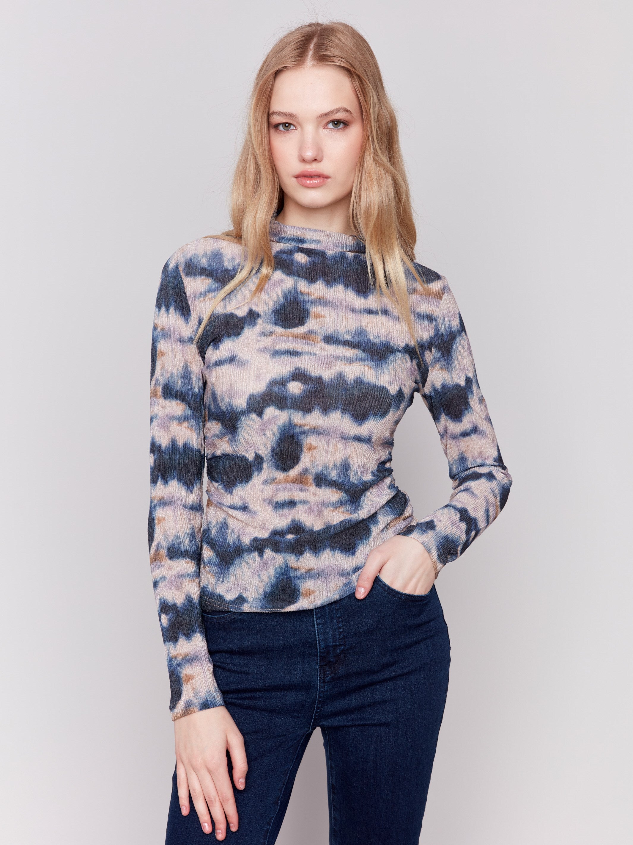 Long sleeve mock neck top with a tie-dye pattern by Charlie B.