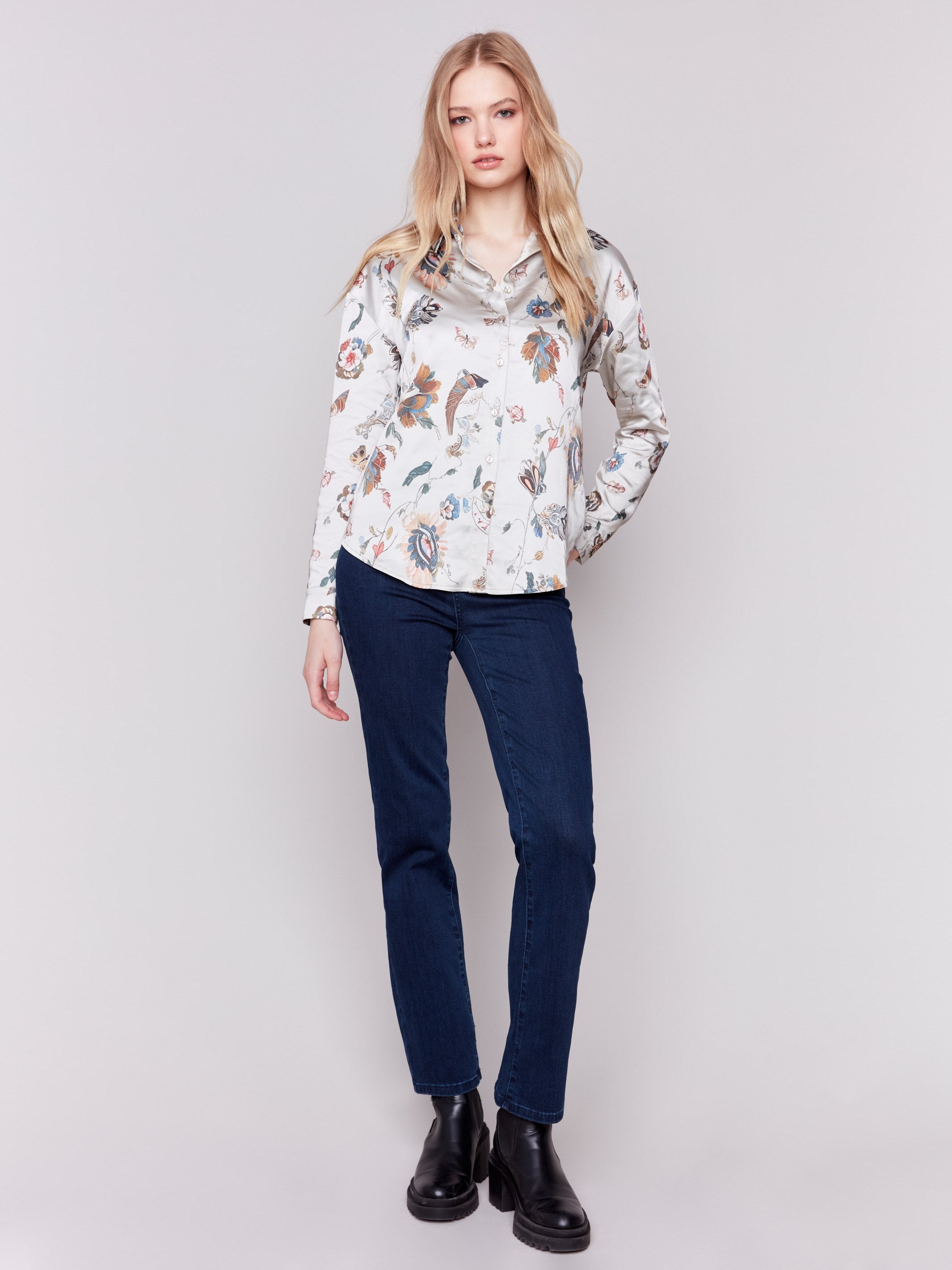 Satin button-down shirt featuring a floral pattern and long sleeves with a classic shirt collar by Charlie B.