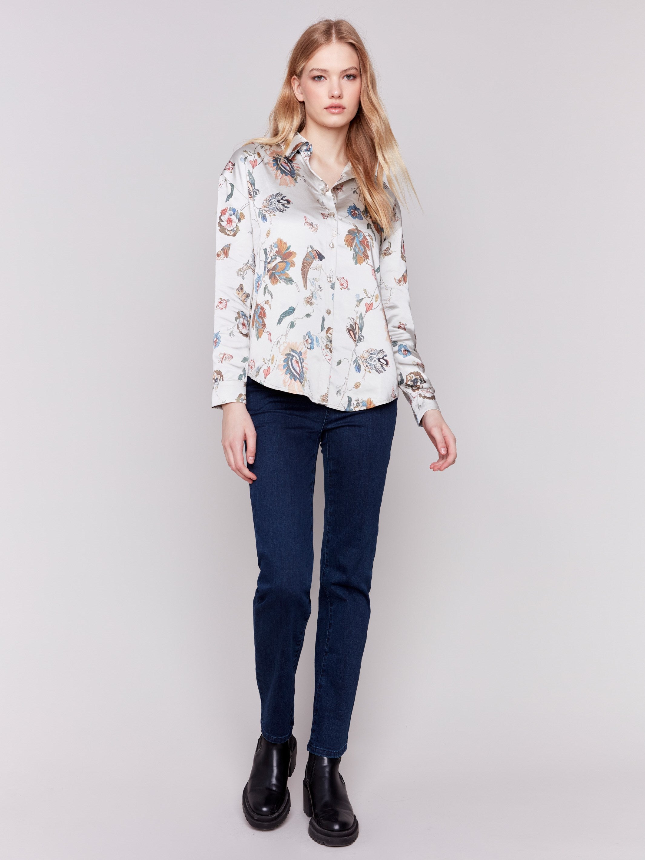 Satin button-down shirt featuring a floral pattern and long sleeves with a classic shirt collar by Charlie B.