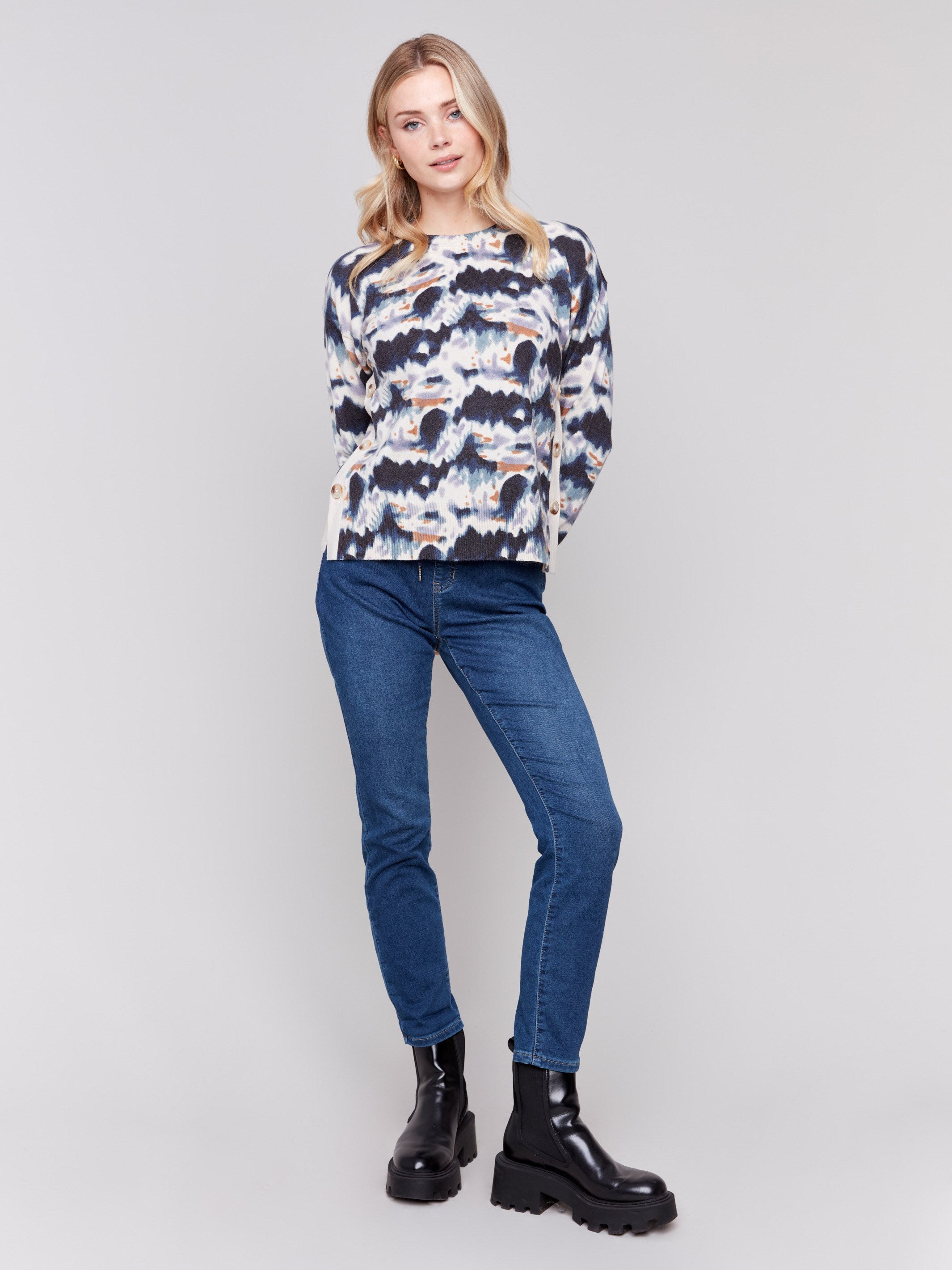 Tie dye printed sweater with long sleeves, crew neck, and side button details by Charlie B.