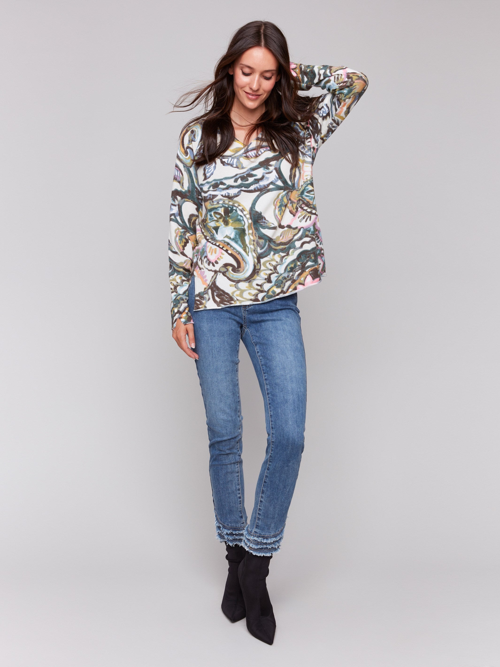 Abstract peacock pattern V-neck sweater with long sleeves by Charlie B.