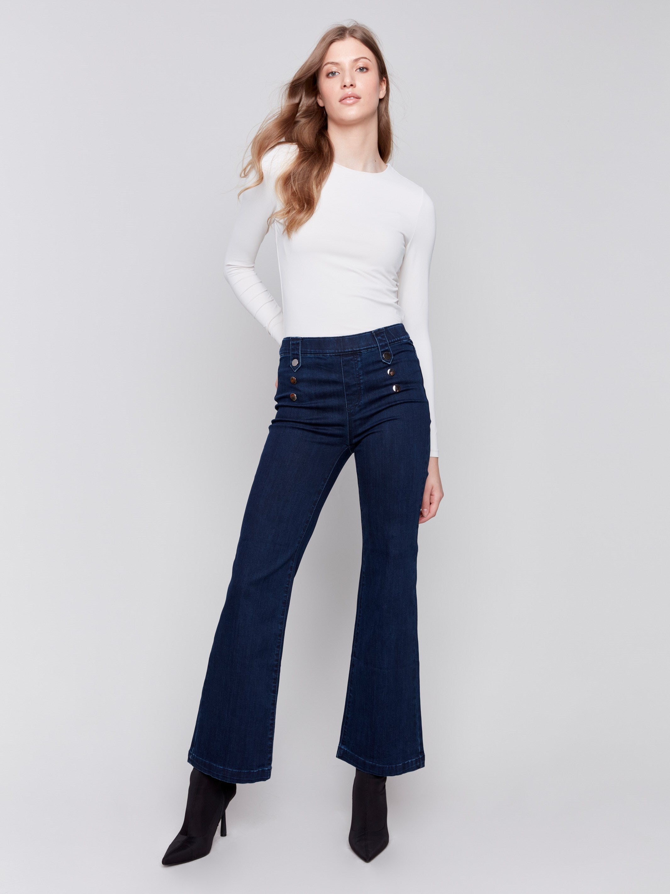 Blue Pull-On Flare Jeans with front buttons and two back patch pockets by Charlie B.