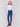 Slim-leg pull-on jeans in indigo blue featuring snap button details at the hem with a regular rise and stretchy fabric by Charlie B.