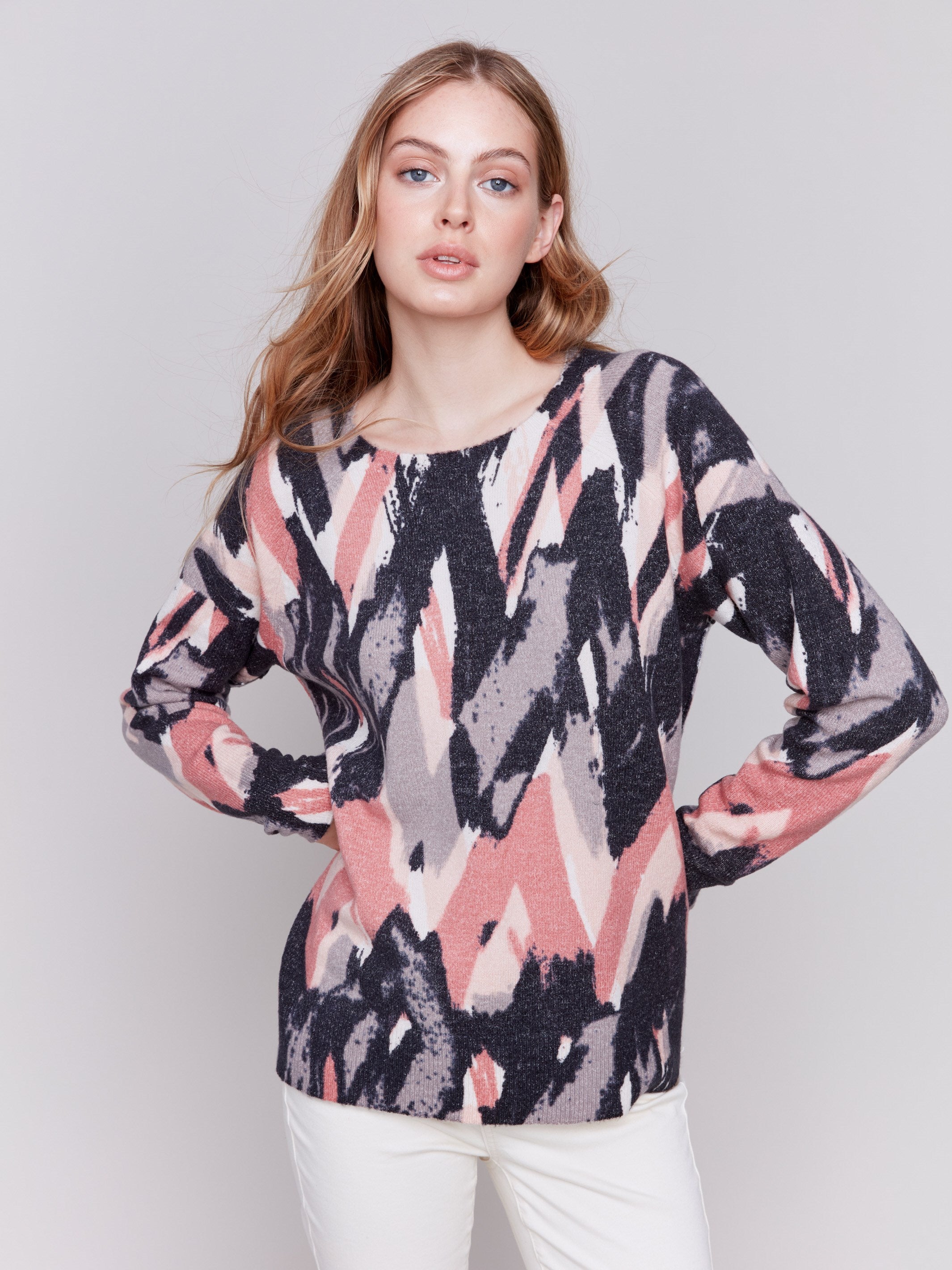 Woodrose reversible sweater with an abstract pattern, featuring raglan sleeves and a crew neckline by Charlie B.