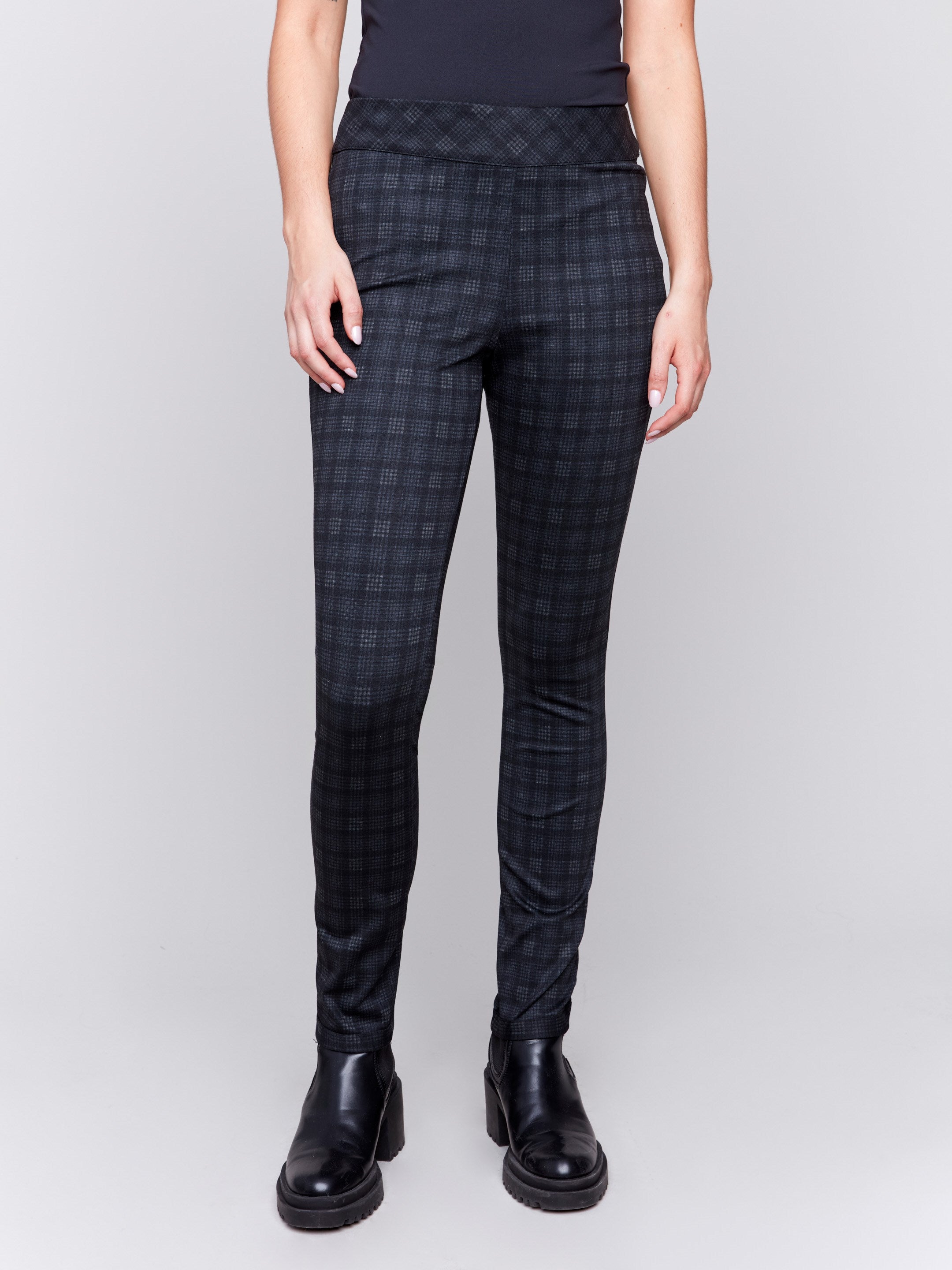 Reversible pull-on pants in grey with plaid pattern on one side and dark pattern on the other, featuring a slim leg and mid-rise fit by Charlie B.