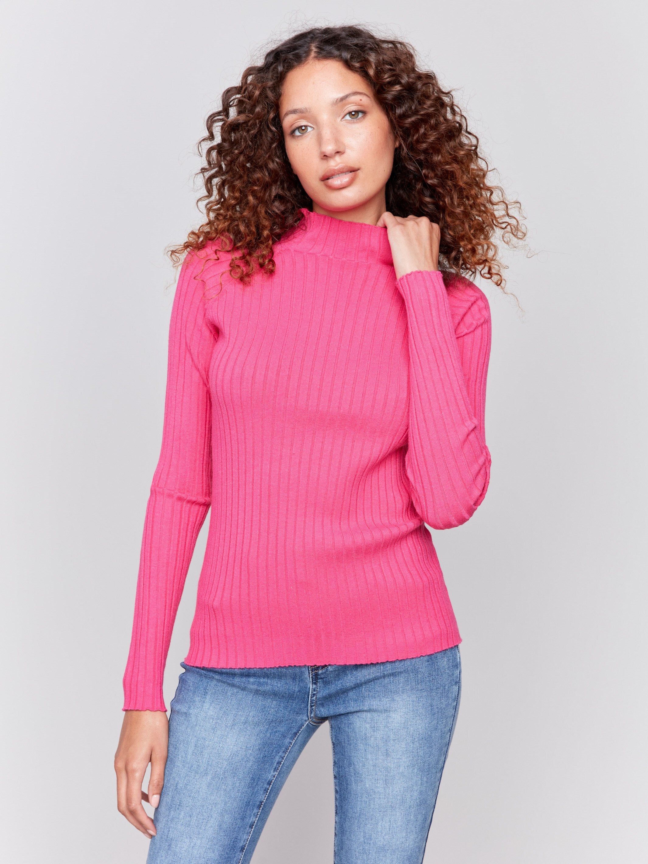 Magenta pink ribbed knit sweater with a mock neck and long sleeves by Charlie B.