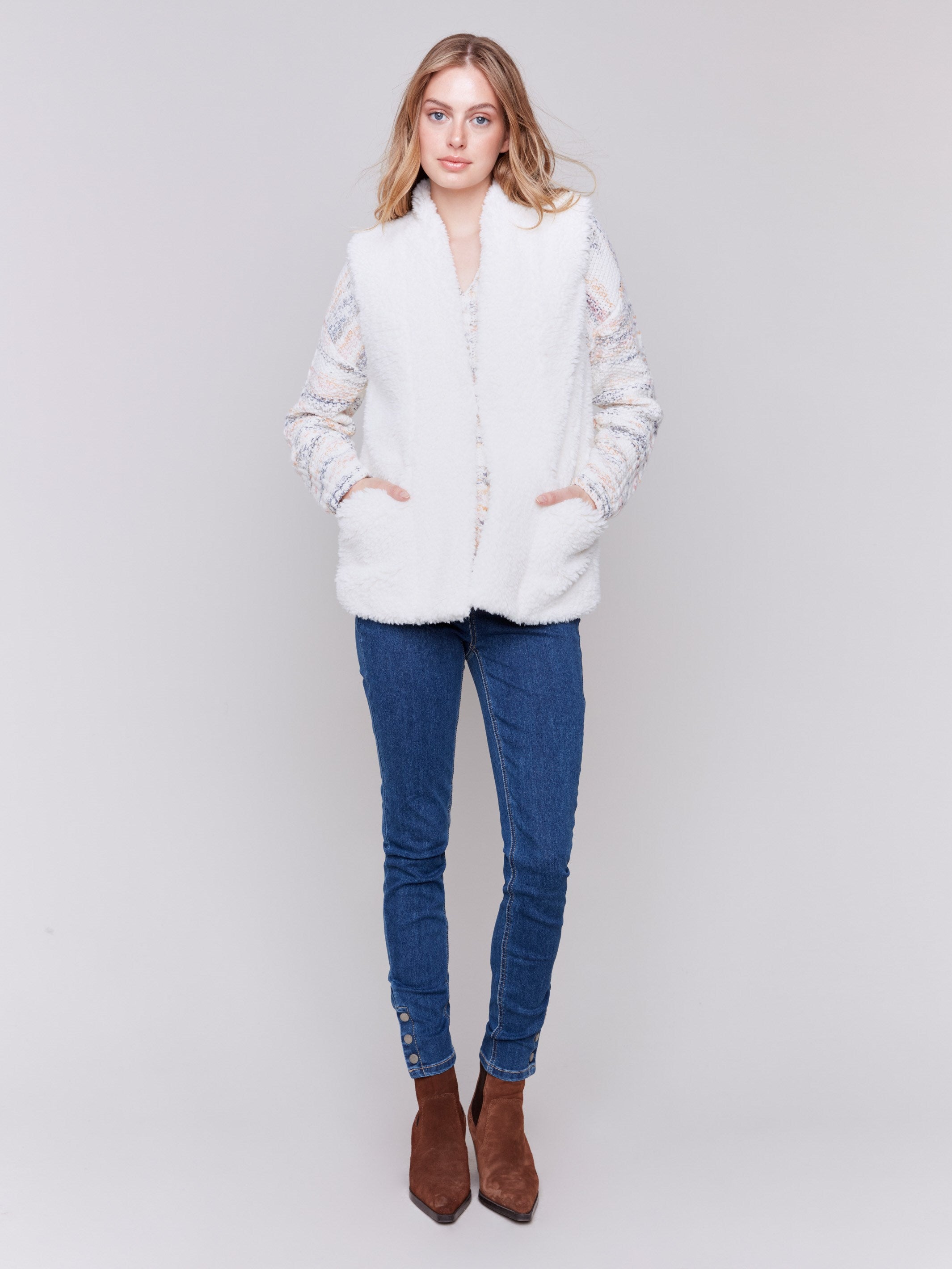 Short ecru white faux fur vest with open front by Charlie B.