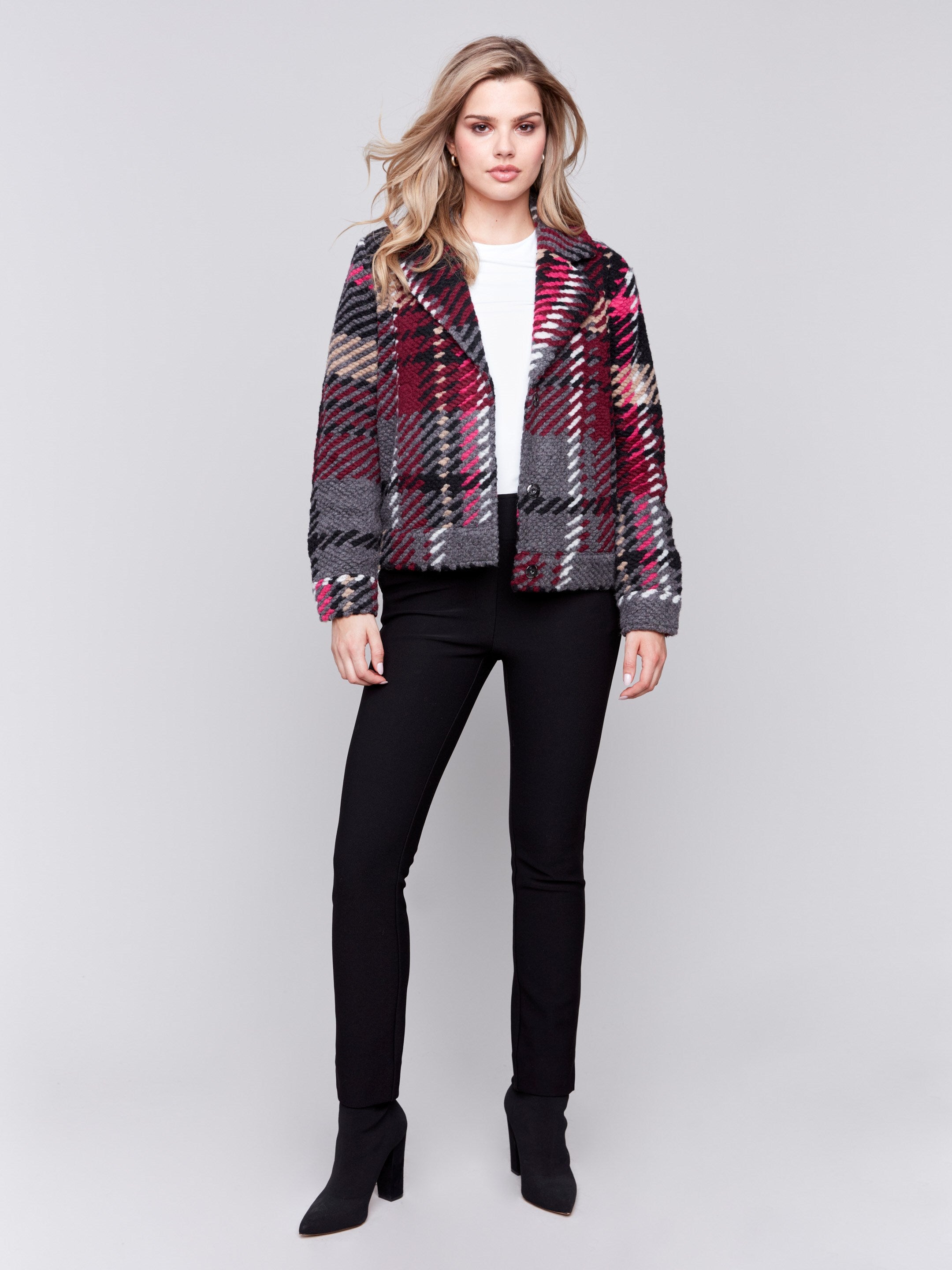 Short, multicolored plaid wool coat with a lapel notch collar and front welt pockets by Charlie B.