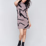 Short-Sleeve Mock Neck Sweater Dress with abstract scribble pattern in black on taupe background by Charlie B.