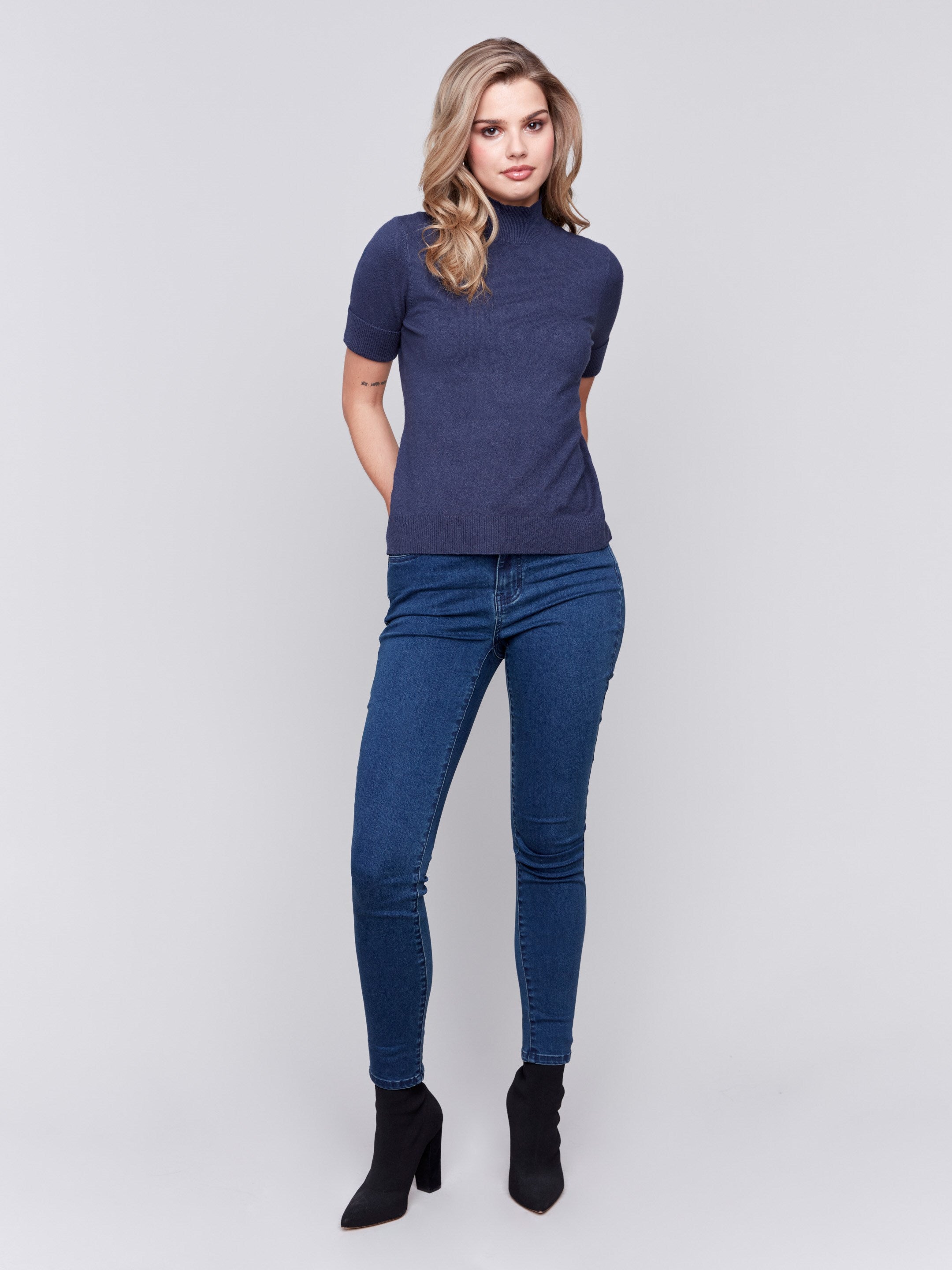 Heather denim short sleeve mock neck sweater with ribbed cuffs and hem by Charlie B.