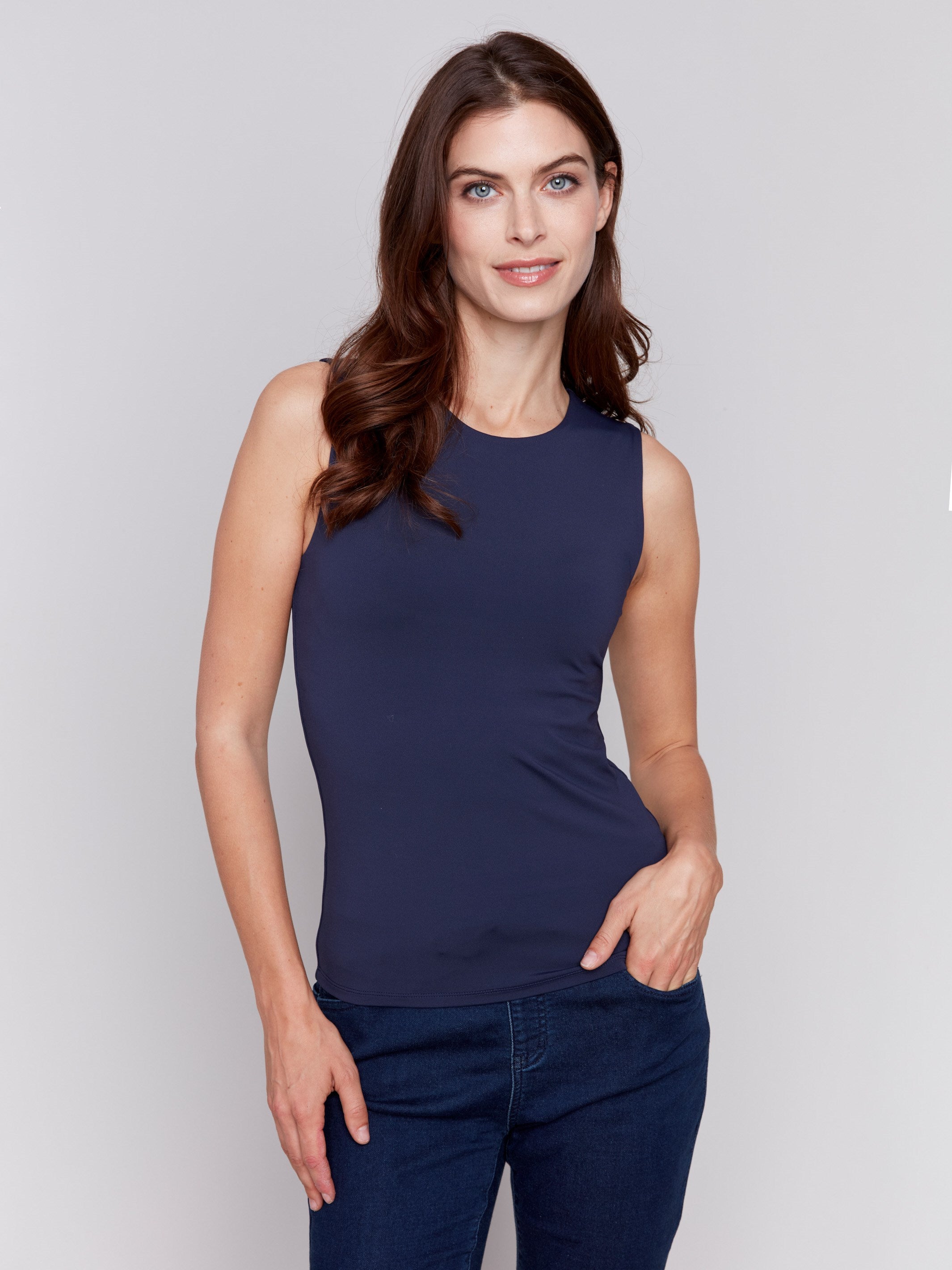 Navy blue sleeveless super stretch top with a crew neckline by Charlie B.