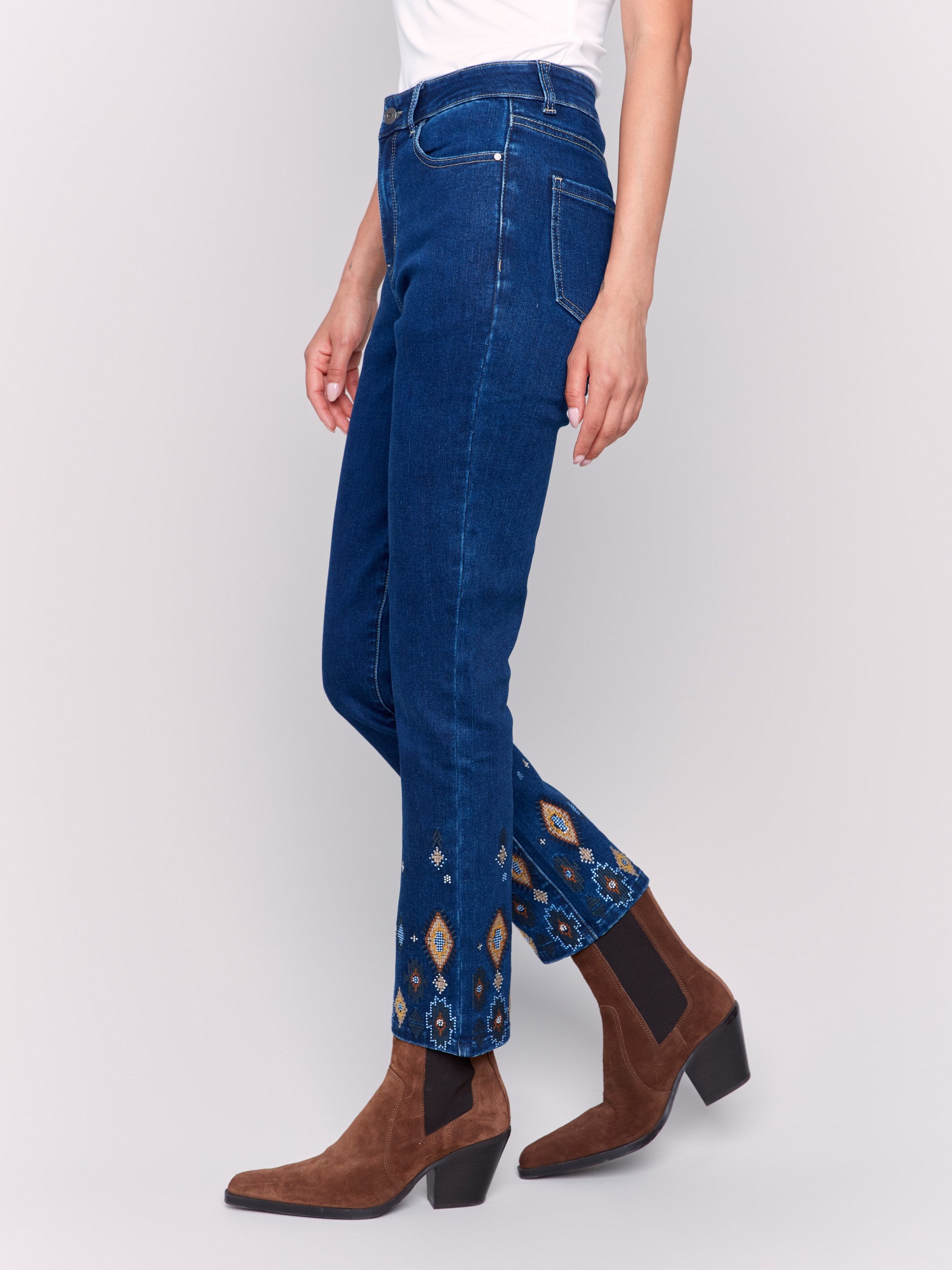 Indigo slim fit jeans with a beaded hem design, featuring a five-pocket style and regular rise by Charlie B.