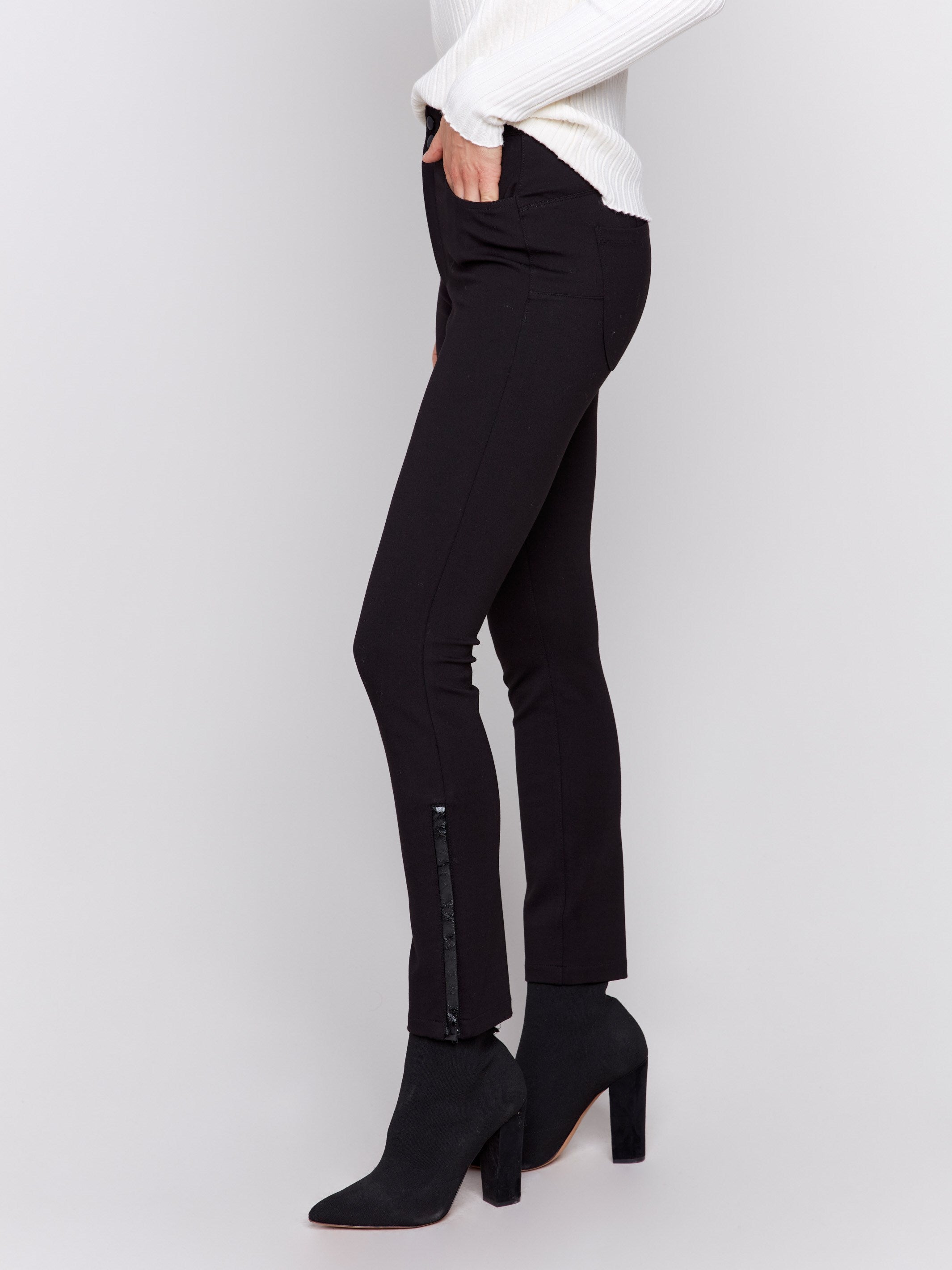 Slim ponte black pants with side vinyl detail, featuring front and back pockets by Charlie B.