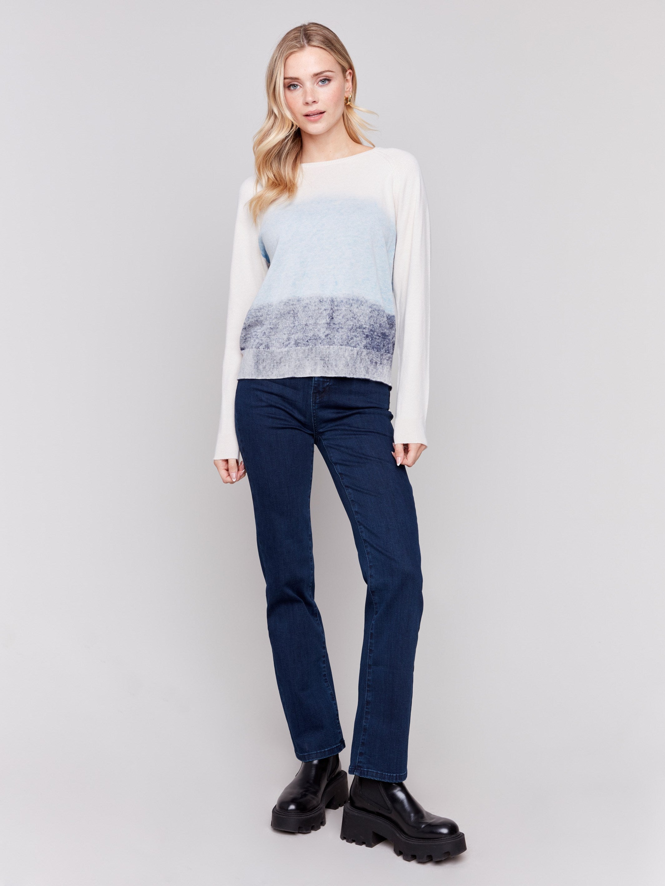 Frost-colored knit sweater with a snow wash gradient effect, long raglan sleeves, and crew neckline by Charlie B.