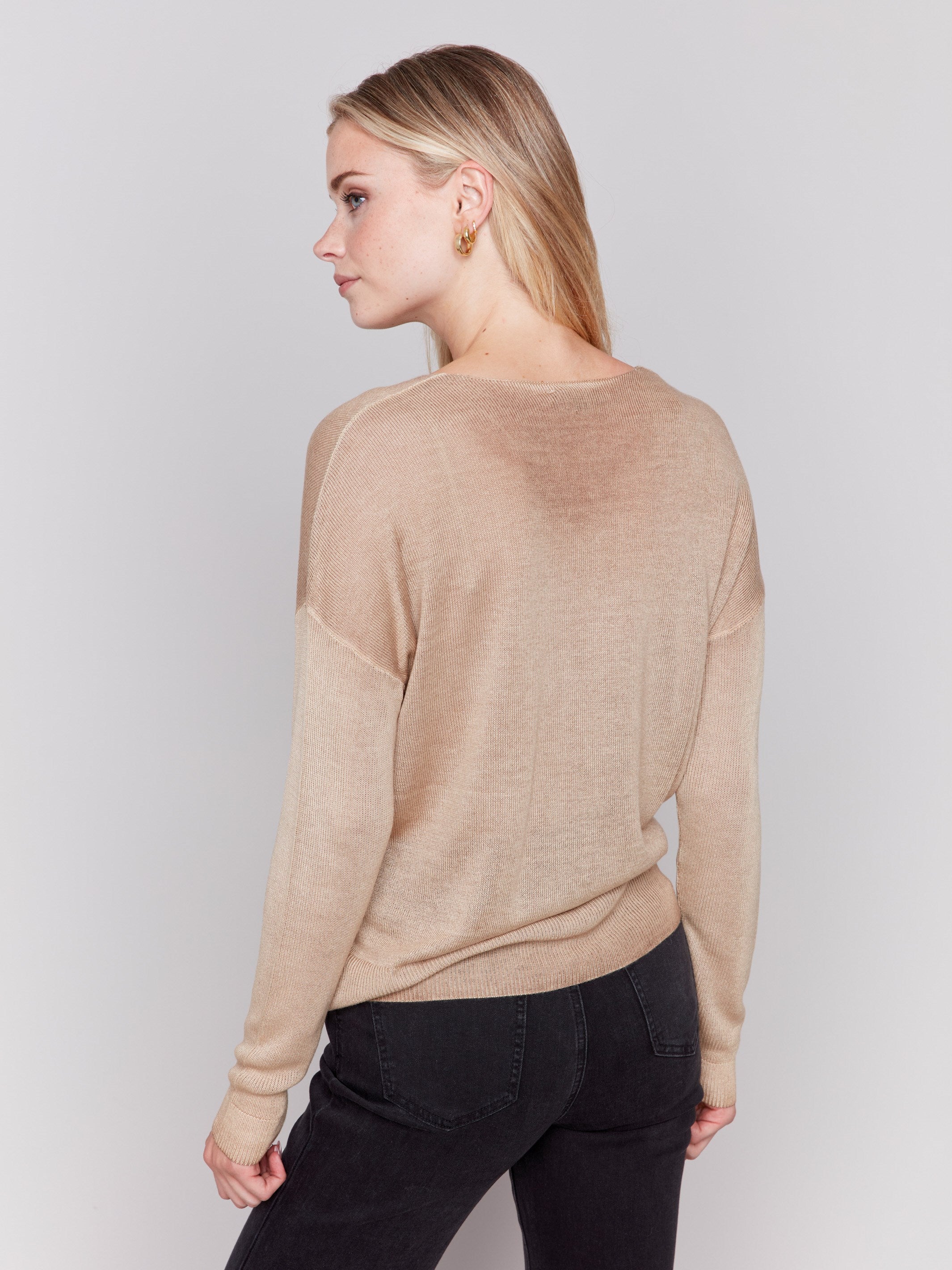 Truffle brown V-neck sweater with long sleeves, showcasing a relaxed fit and snow wash texture by Charlie B.