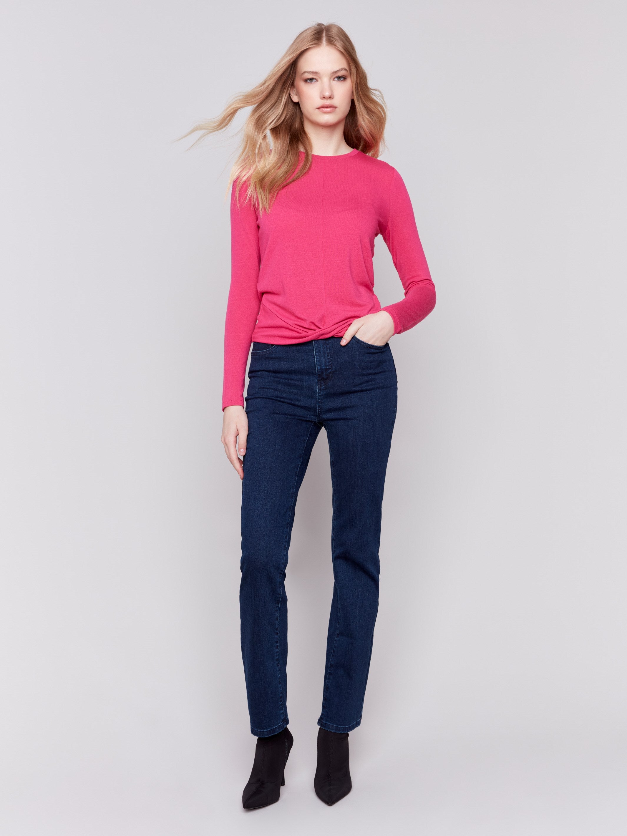 Magenta pink long-sleeve jersey top featuring a crew neckline and a unique front knot detail by Charlie B.