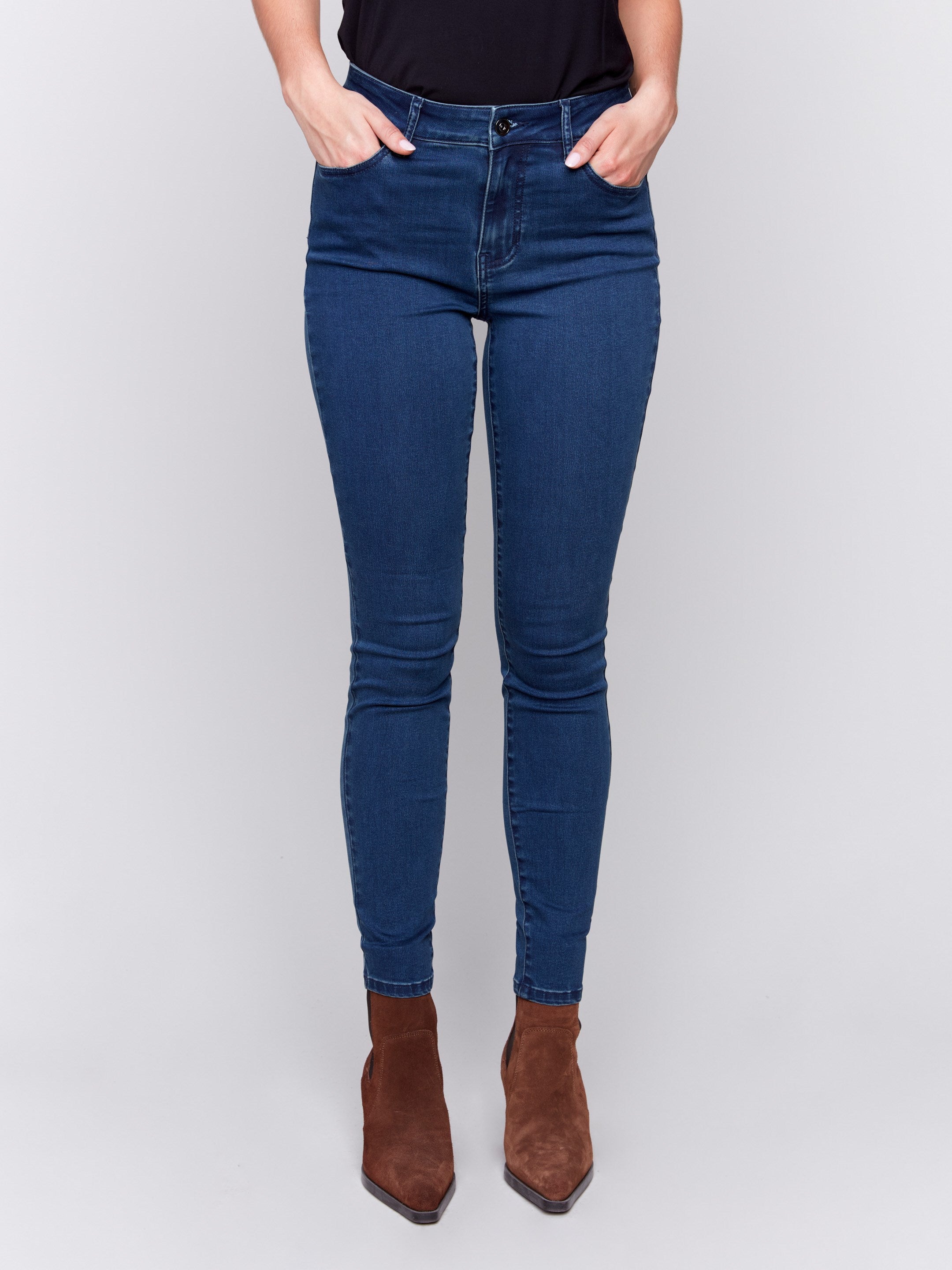 Blue black skinny jeans featuring a five-pocket design and a regular rise by Charlie B.