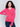 Magenta pink V-neck sweater with long sleeves featuring side slits, made from plushy yarn by Charlie B.