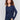 Navy blue V-neck sweater with long sleeves featuring side slits, made from plushy yarn by Charlie B.