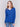 Sapphire blue V-neck sweater with long sleeves featuring side slits, made from plushy yarn by Charlie B.