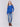 Sapphire blue V-neck sweater with long sleeves featuring side slits, made from plushy yarn by Charlie B.