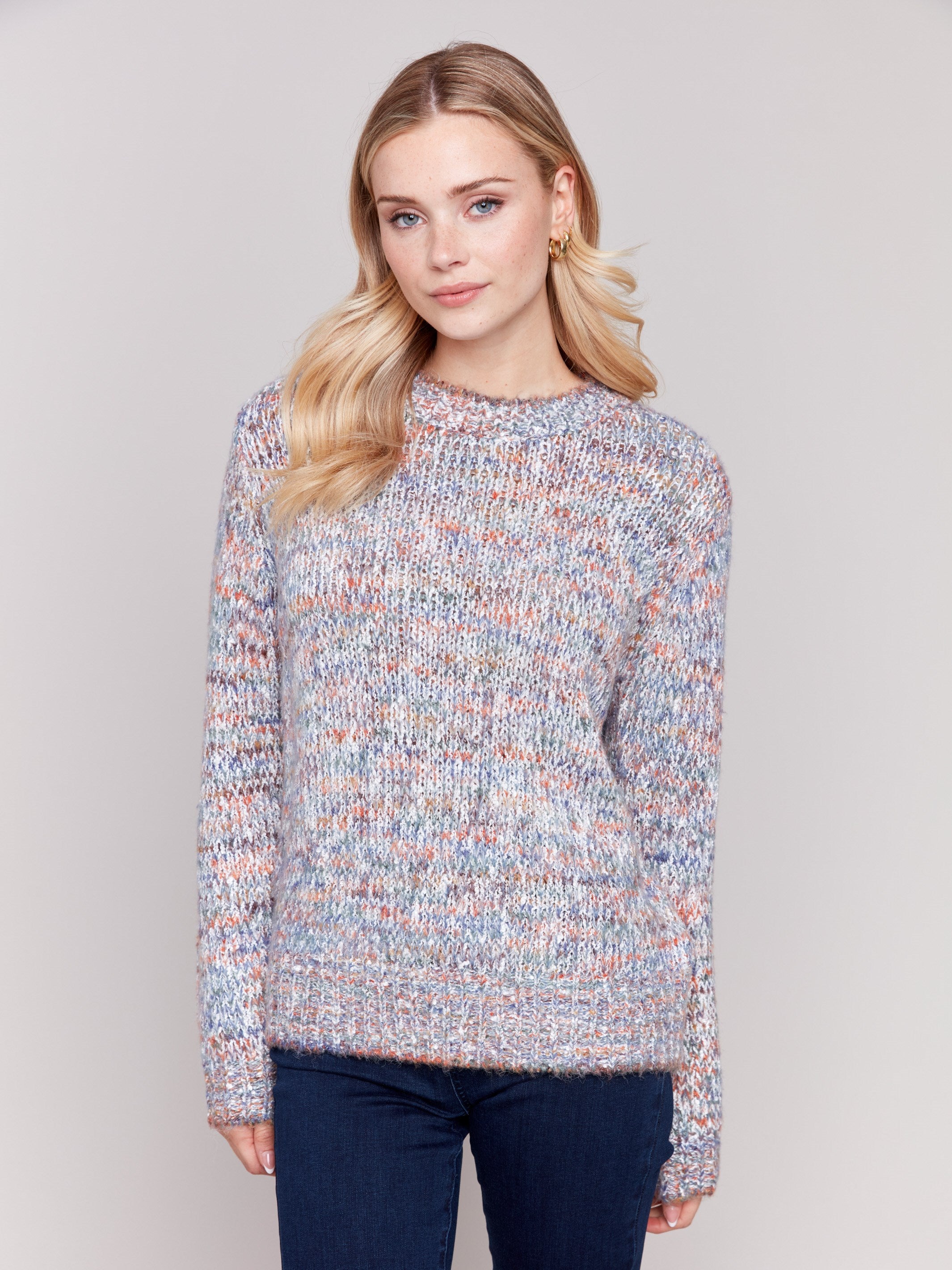 Multicolored space dye knit sweater with long sleeves and a crew neckline by Charlie B.