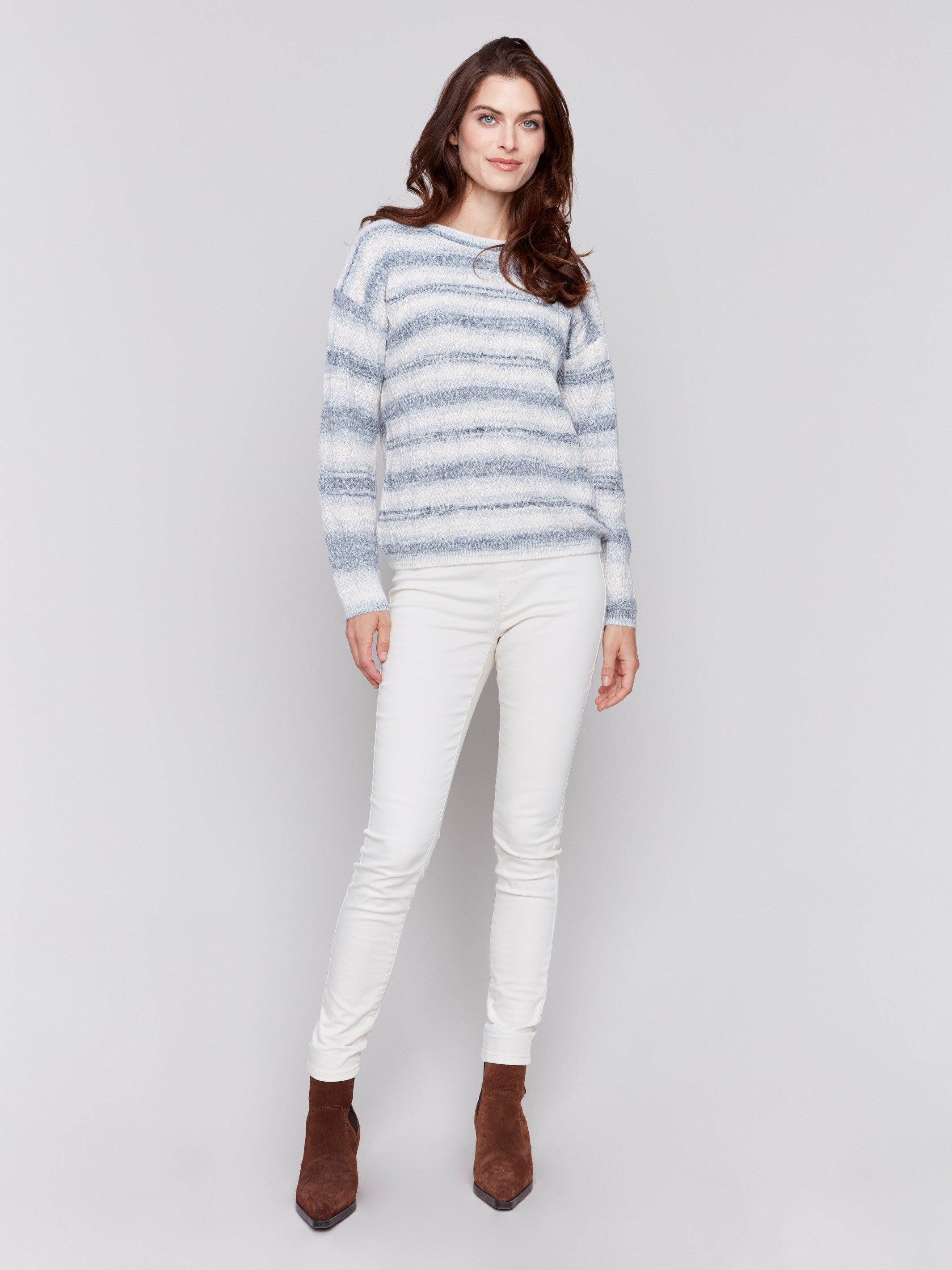 Space-dye stripes sweater with a crew neckline, long sleeves, and ribbed cuffs and hem by Charlie B.