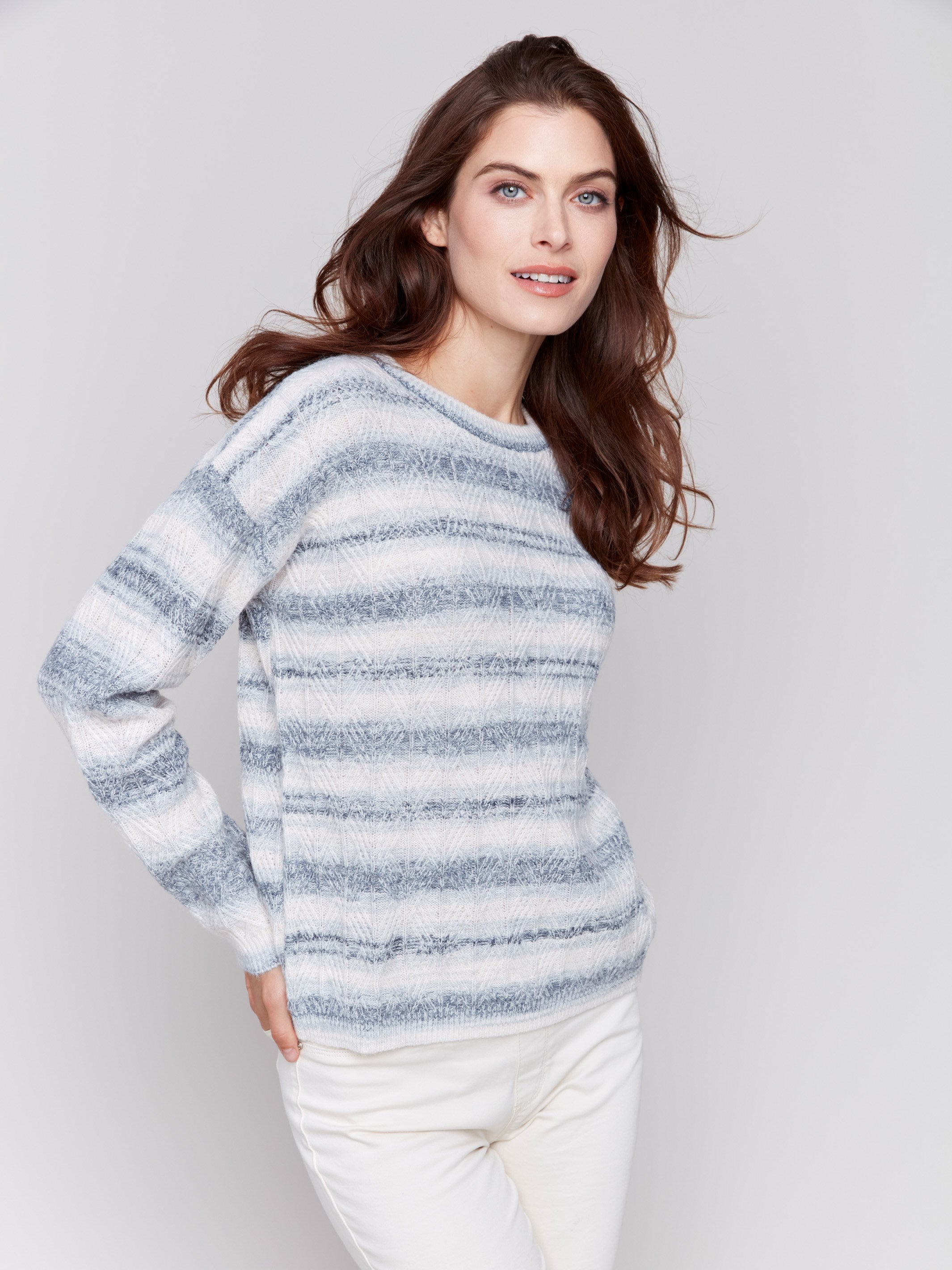 Space-dye stripes sweater with a crew neckline, long sleeves, and ribbed cuffs and hem by Charlie B.