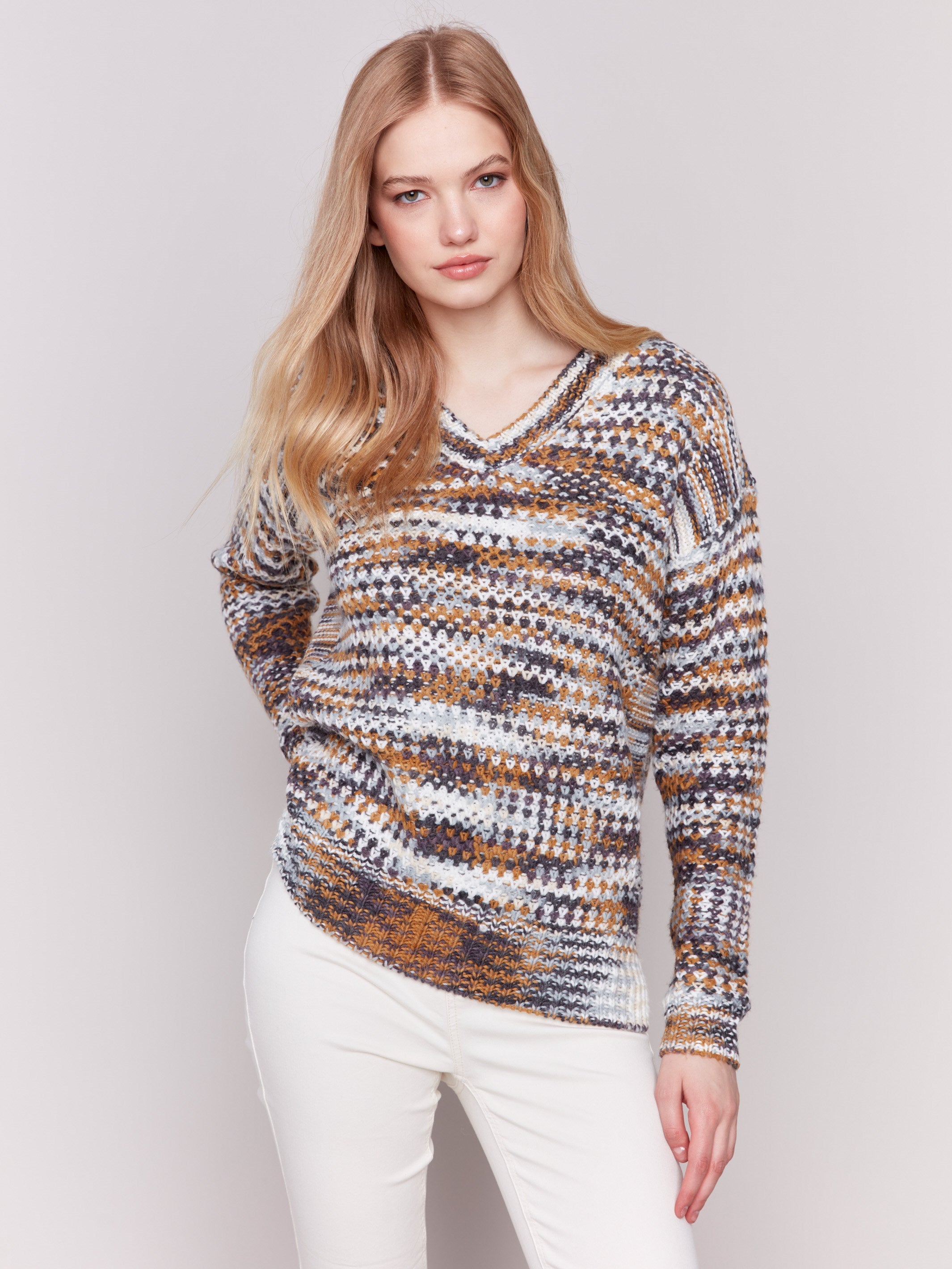 Colorful denim-toned space dye V-neck sweater with long sleeves by Charlie B.