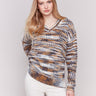 Colorful denim-toned space dye V-neck sweater with long sleeves by Charlie B.