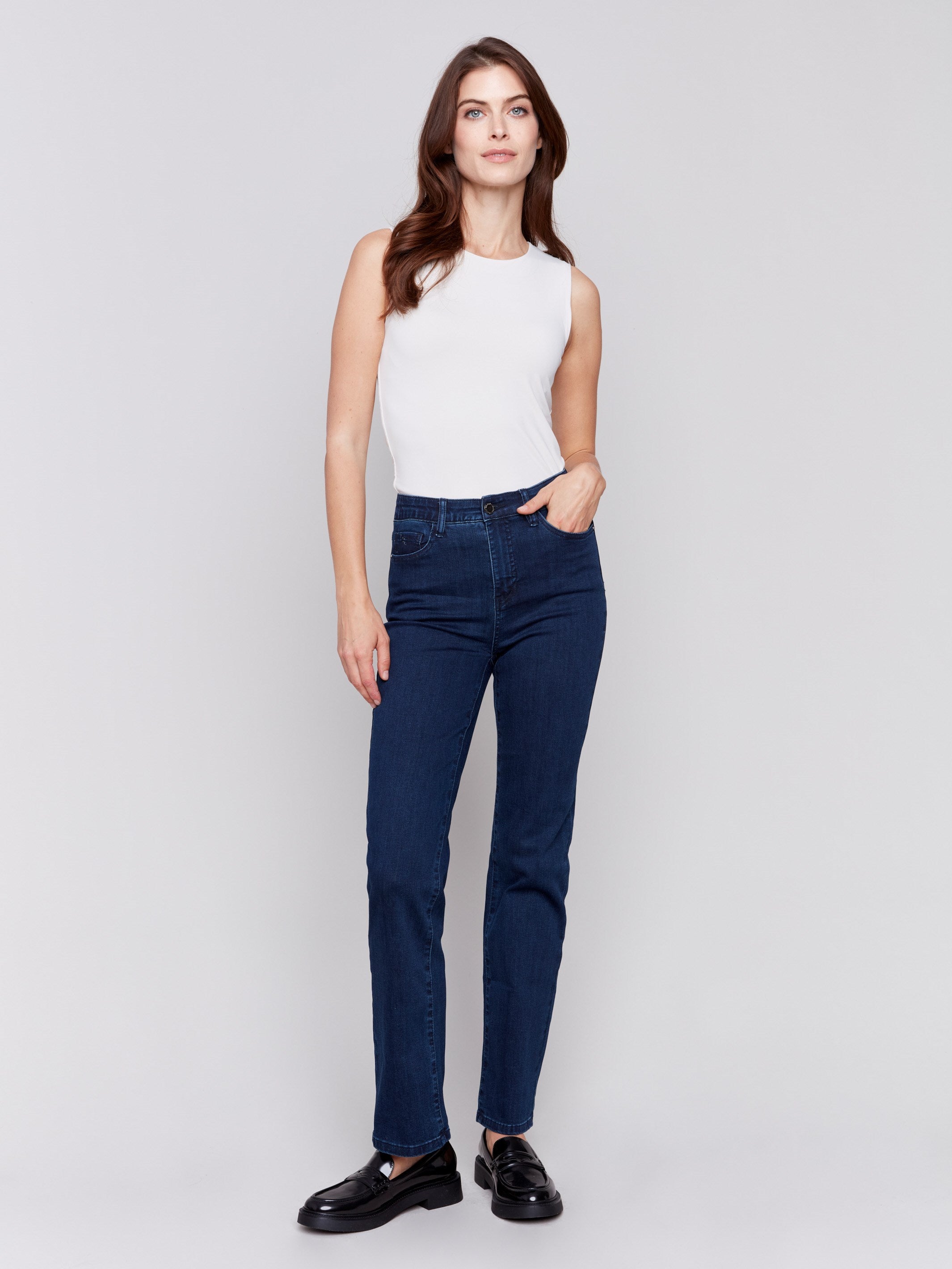 Classic dark blue denim jeans with a straight-leg design, mid-rise, and elastic waistband for women by Charlie B.