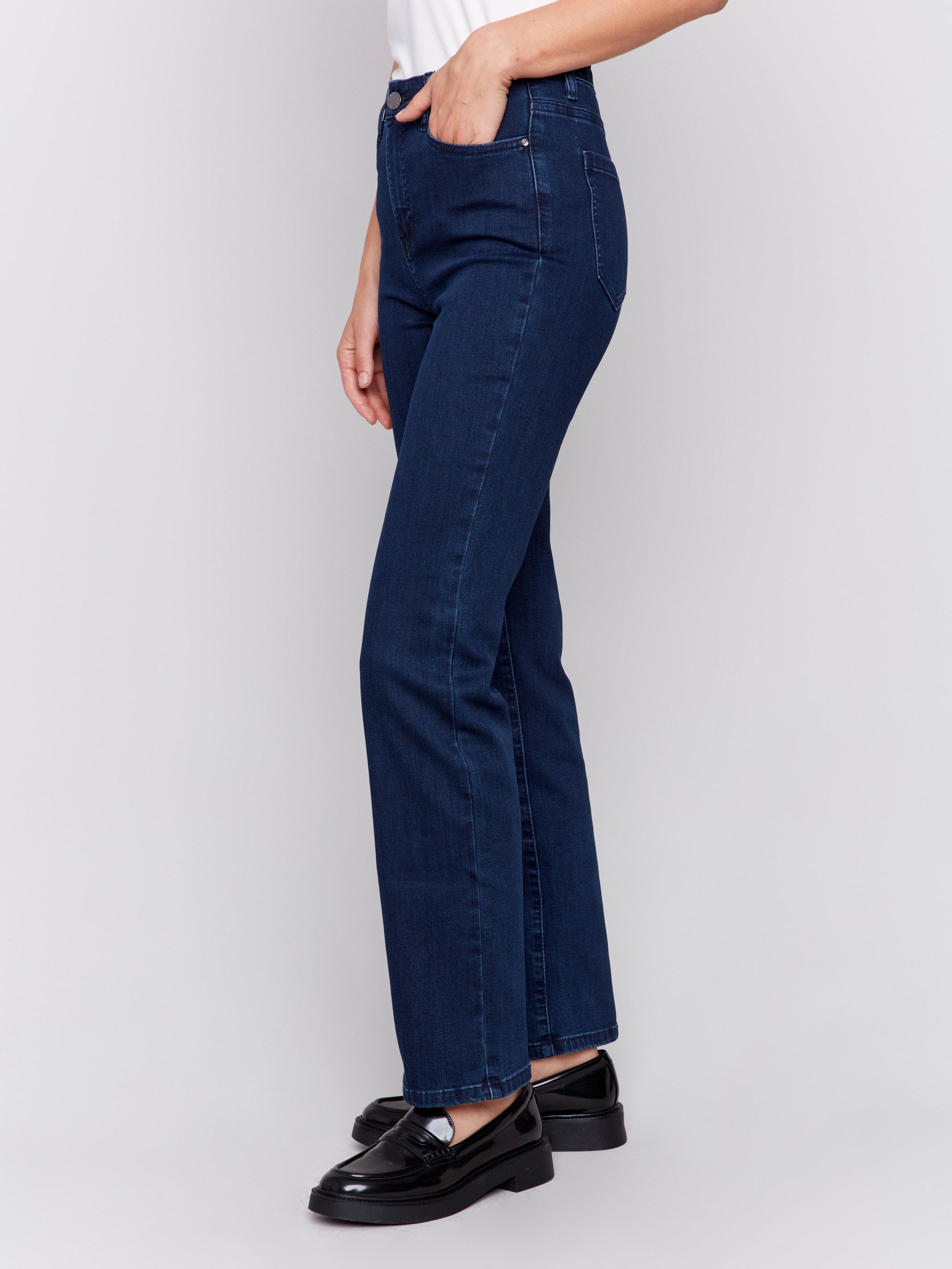 Classic dark blue denim jeans with a straight-leg design, mid-rise, and elastic waistband for women by Charlie B.