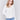 Ecru white long-sleeve sweater with front knot detail and V-neckline by Charlie B.